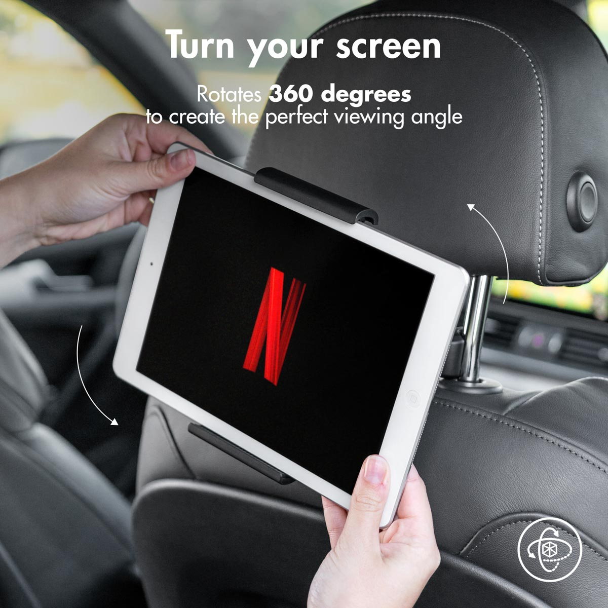 Hands rotate a tablet on a car seat. The tablet displays the Netflix logo. The holder is black.