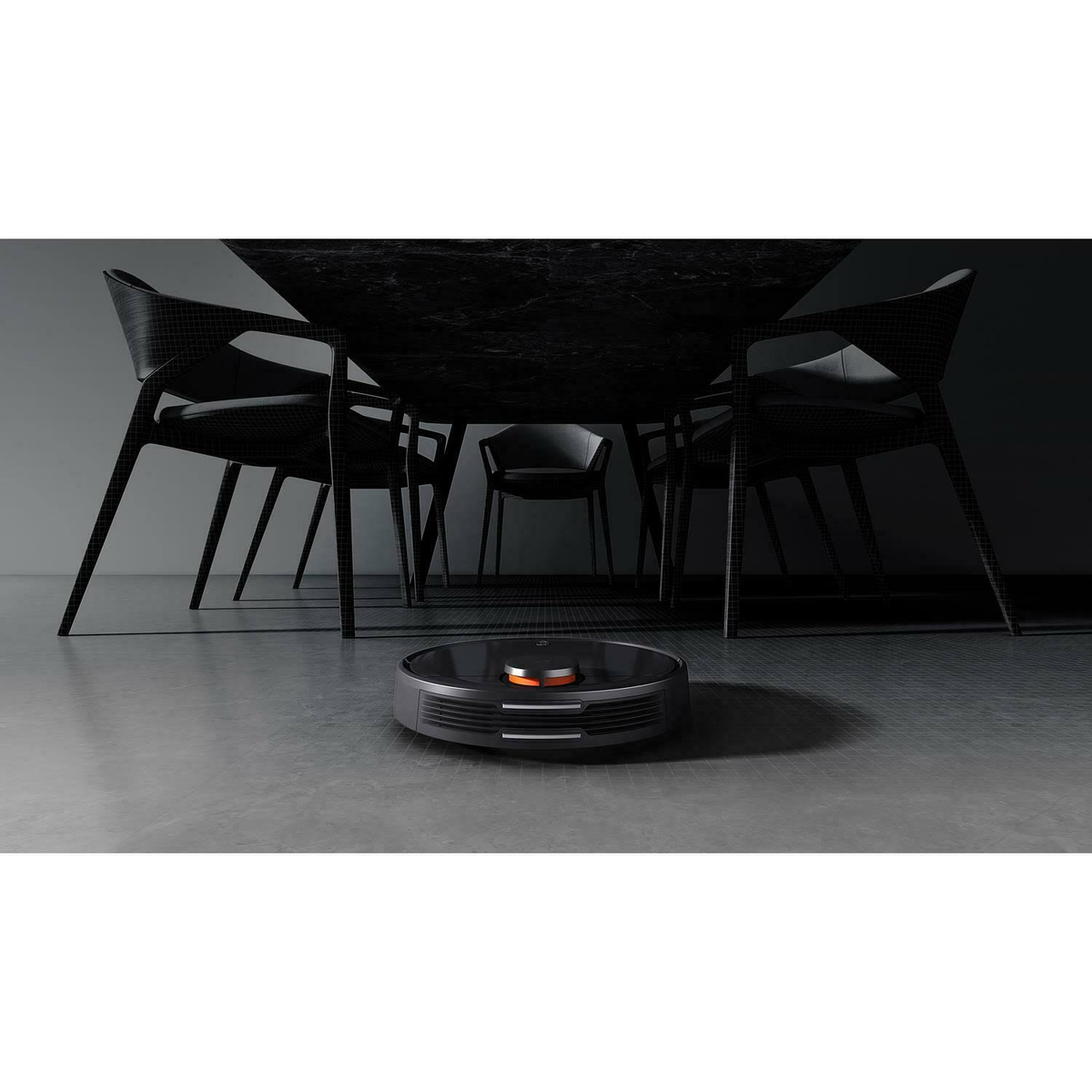 Aspiradora robot bajo una mesa con sillas. Es oscuro y el suelo es gris.