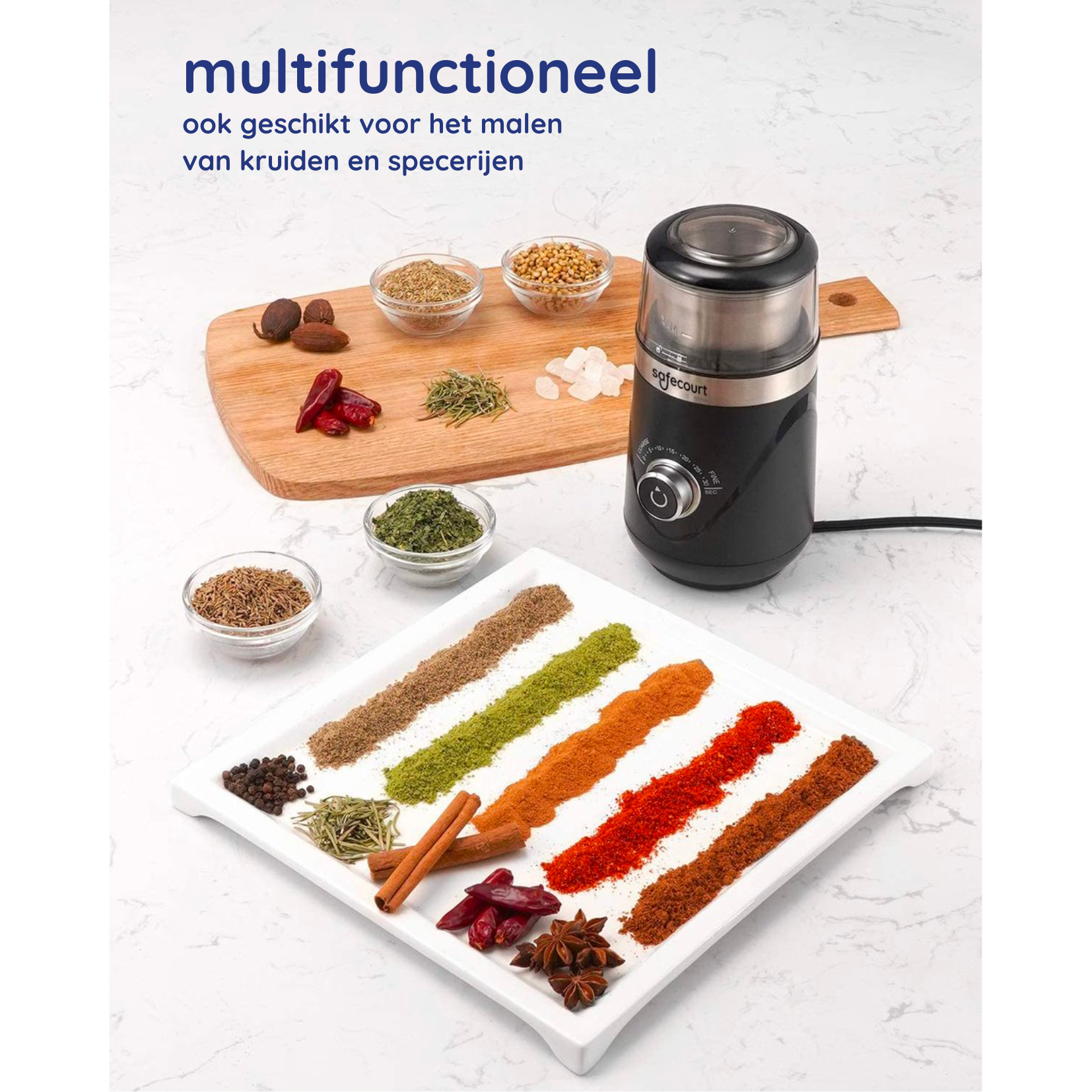 A black spice grinder with different spices. There are various spices on a white tray.
