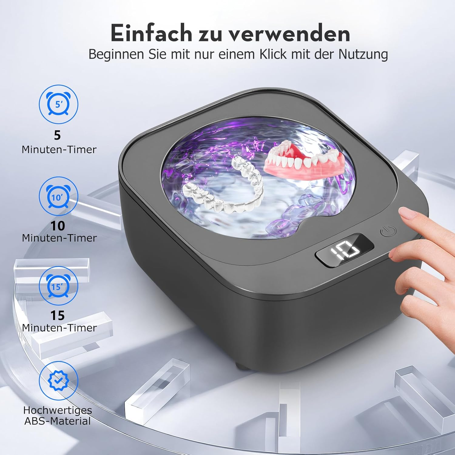 Ein Zahnreiniger mit Timer-Optionen und einem Bild von Zahnersatz.