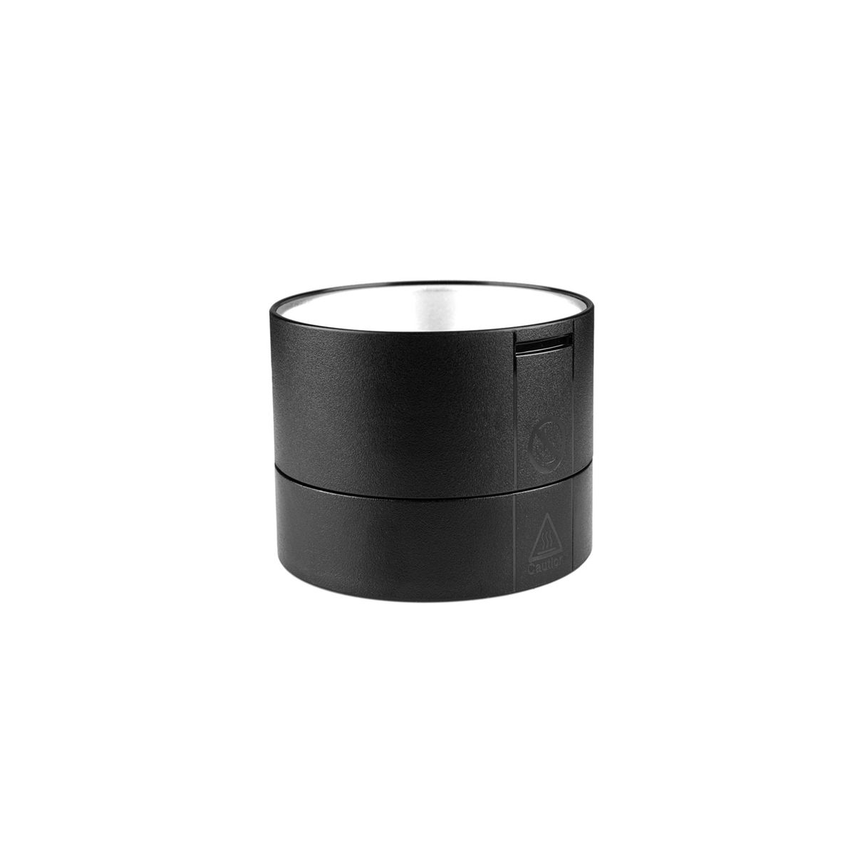 Un objet cylindrique noir avec un intérieur blanc et une petite ouverture en haut.