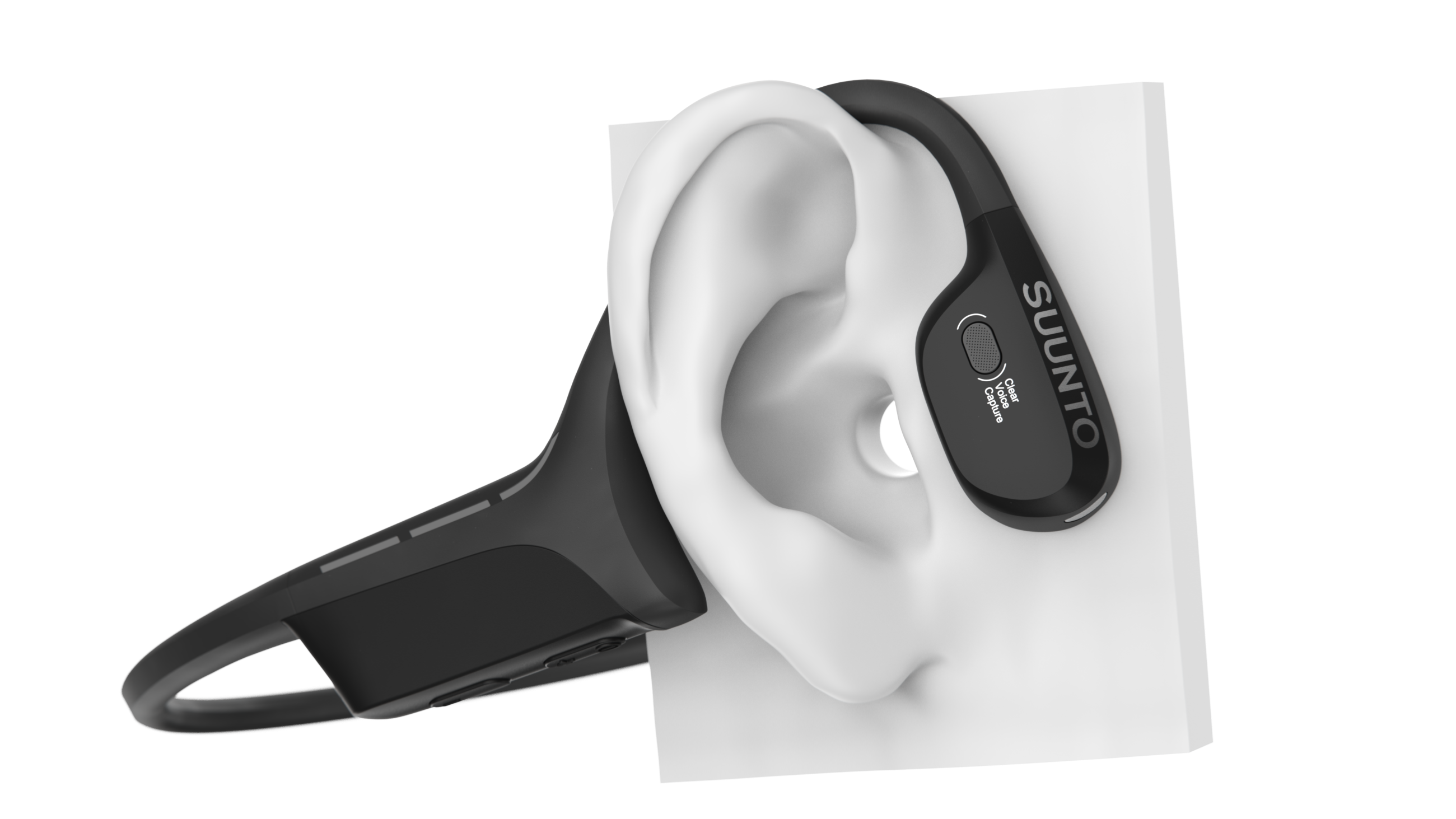 Czarny słuchawka przewodnictwa kostnego noszona na białym uchu, z widoczną marką SUNTO.