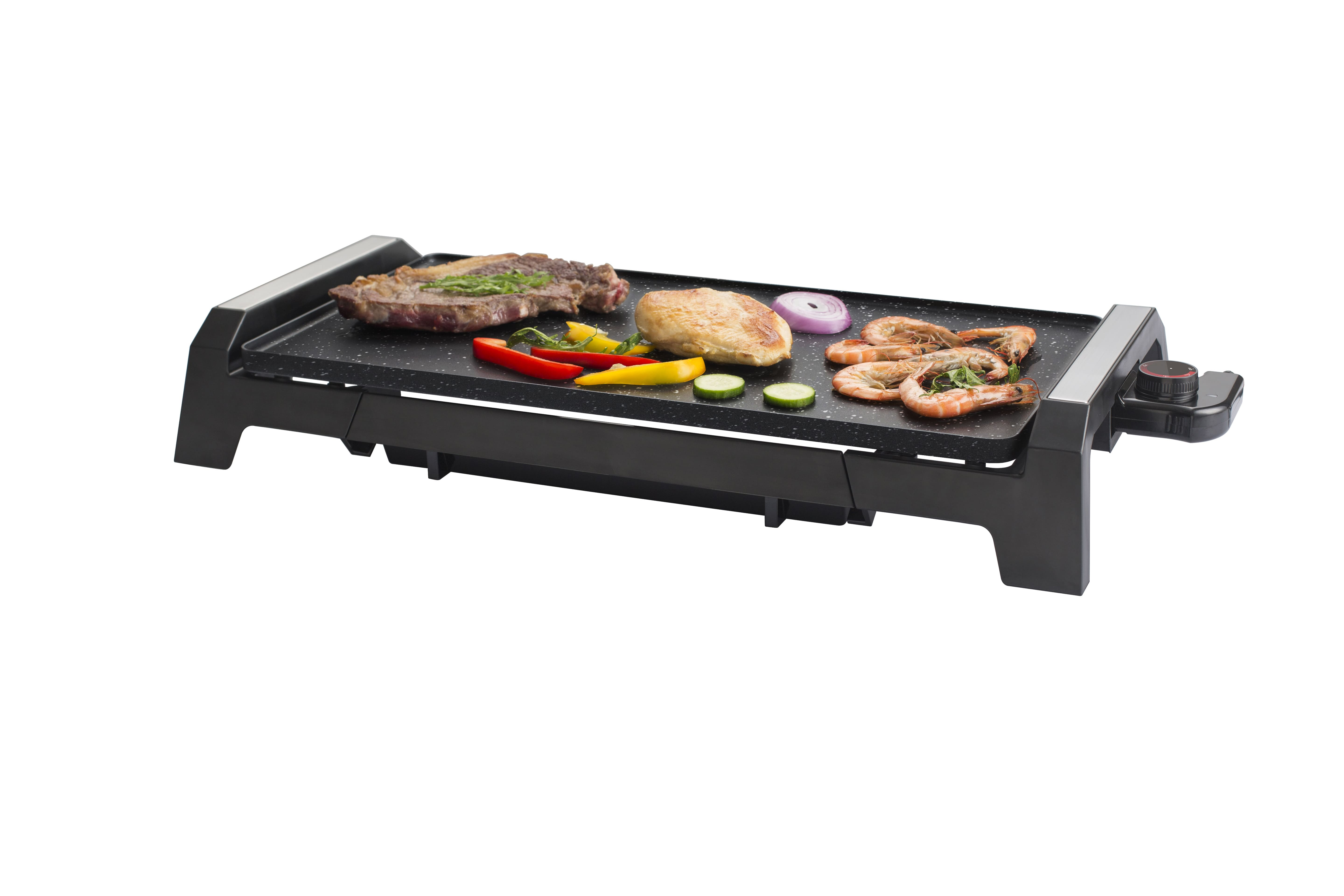 Elektrischer Grill mit verschiedenen gegarten Speisen auf weißer Fläche.