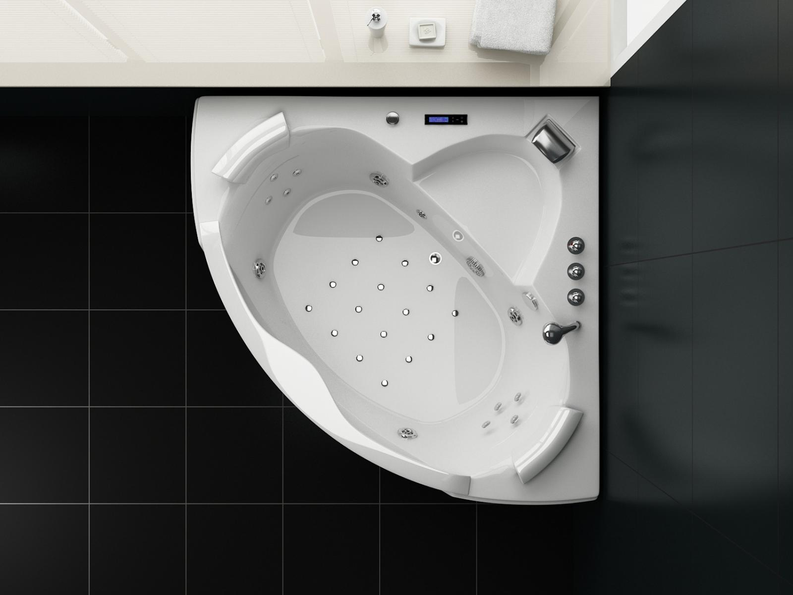 Draufsicht auf eine weiße, herzförmige Badewanne in einem Badezimmer mit schwarzen Fliesen.