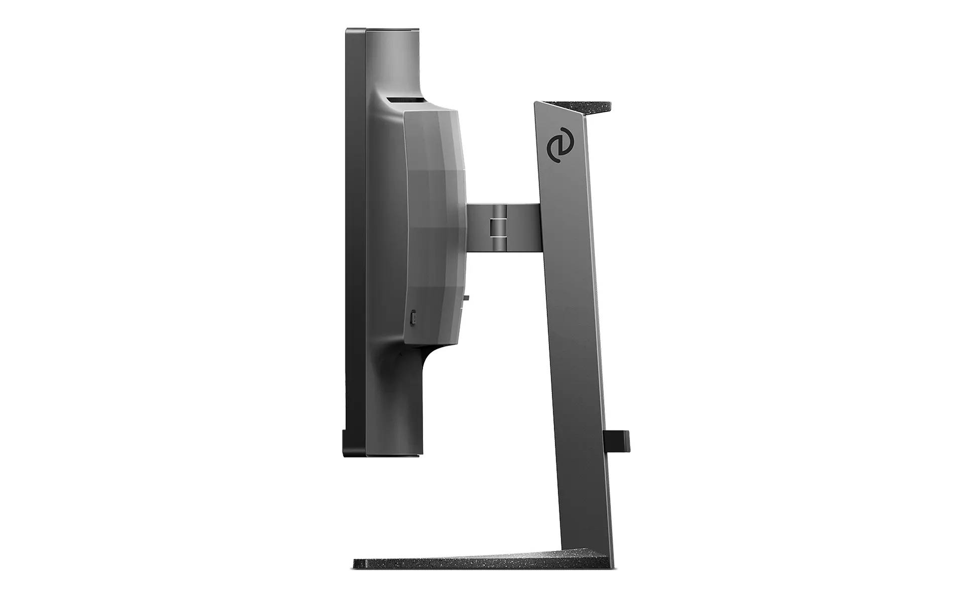 Widok z boku czarnego monitora komputerowego ze srebrną podstawą i czarnymi akcentami, na białym tle.