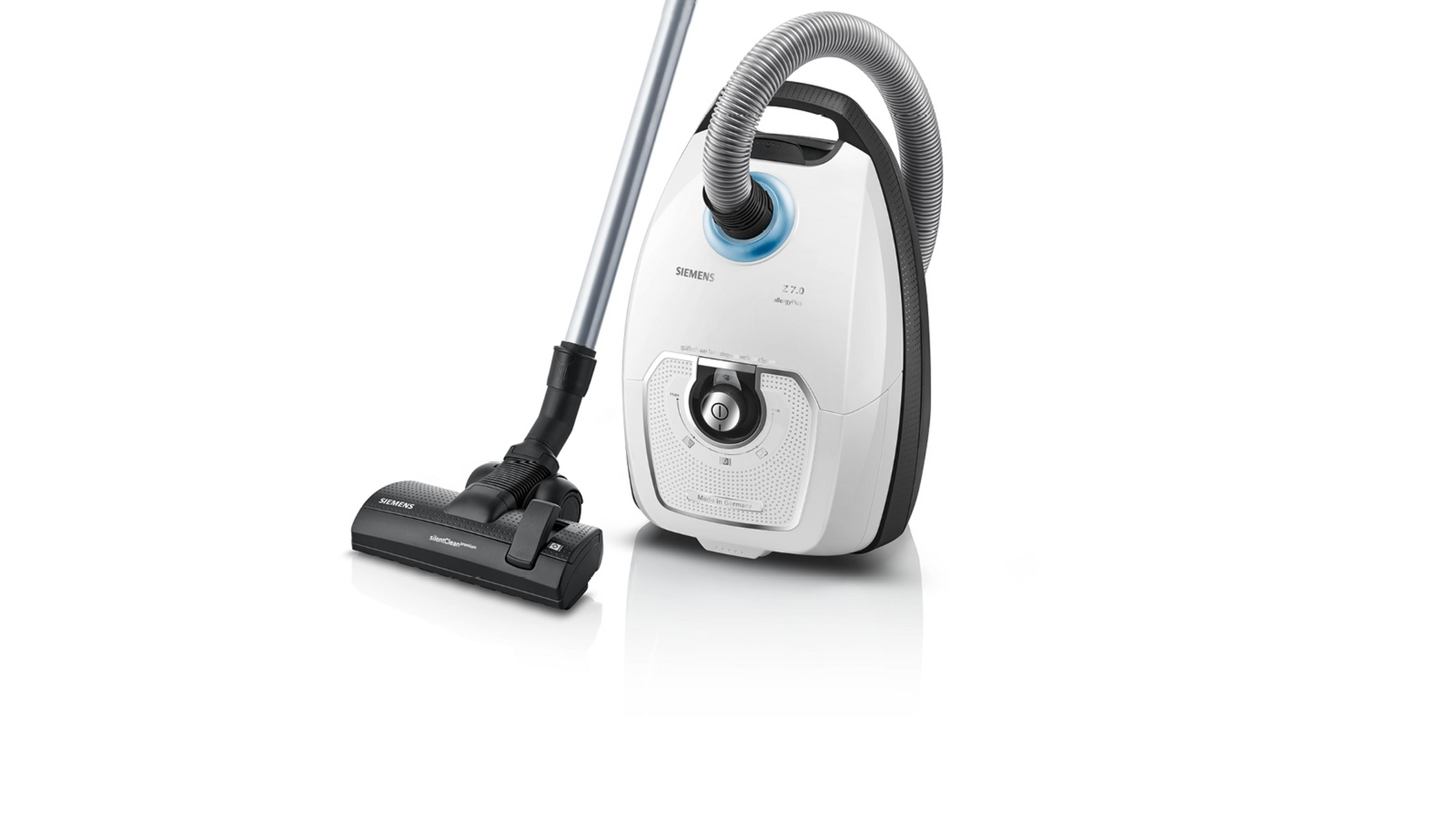Biały odkurzacz Siemens z czarną dyszą i białym tłem.