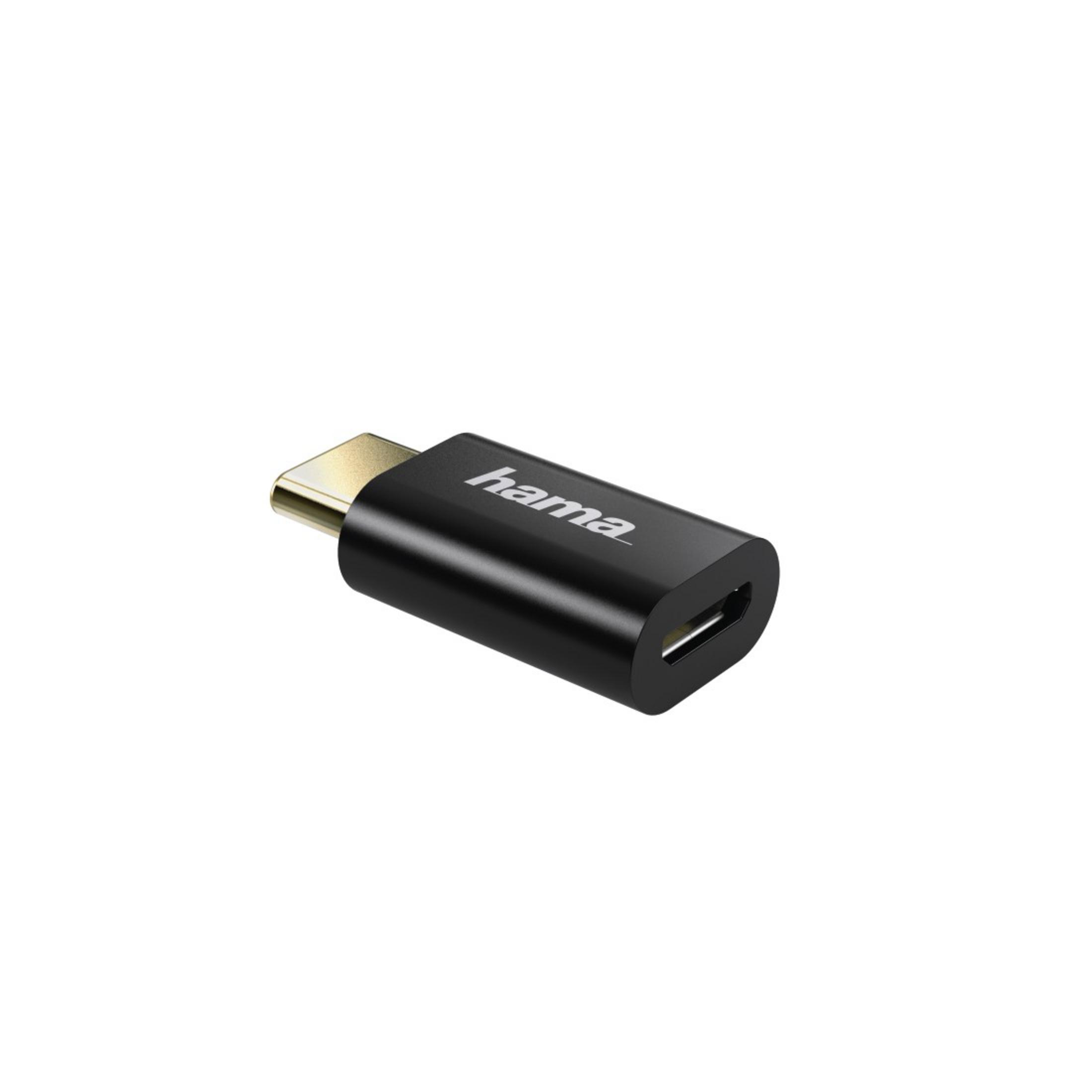Mała, czarna przejściówka USB-C na Micro USB.