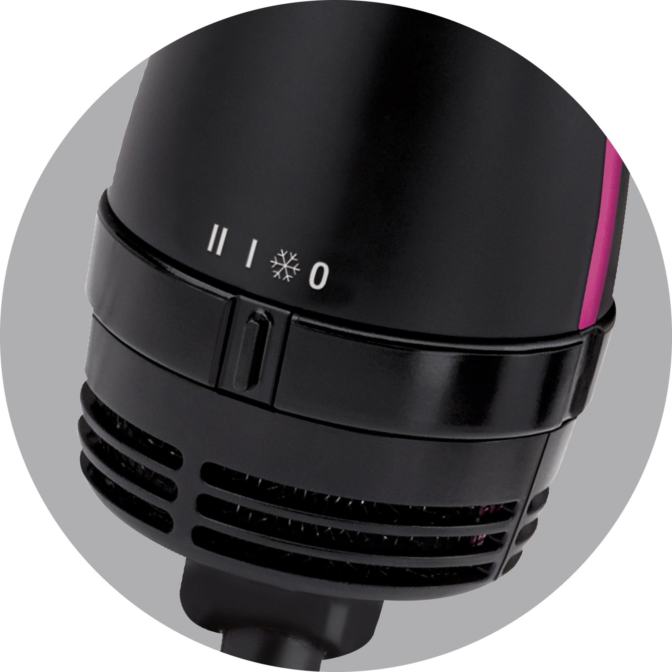 Zbliżenie czarnej suszarki do włosów z elementami sterującymi i różowym wnętrzem.