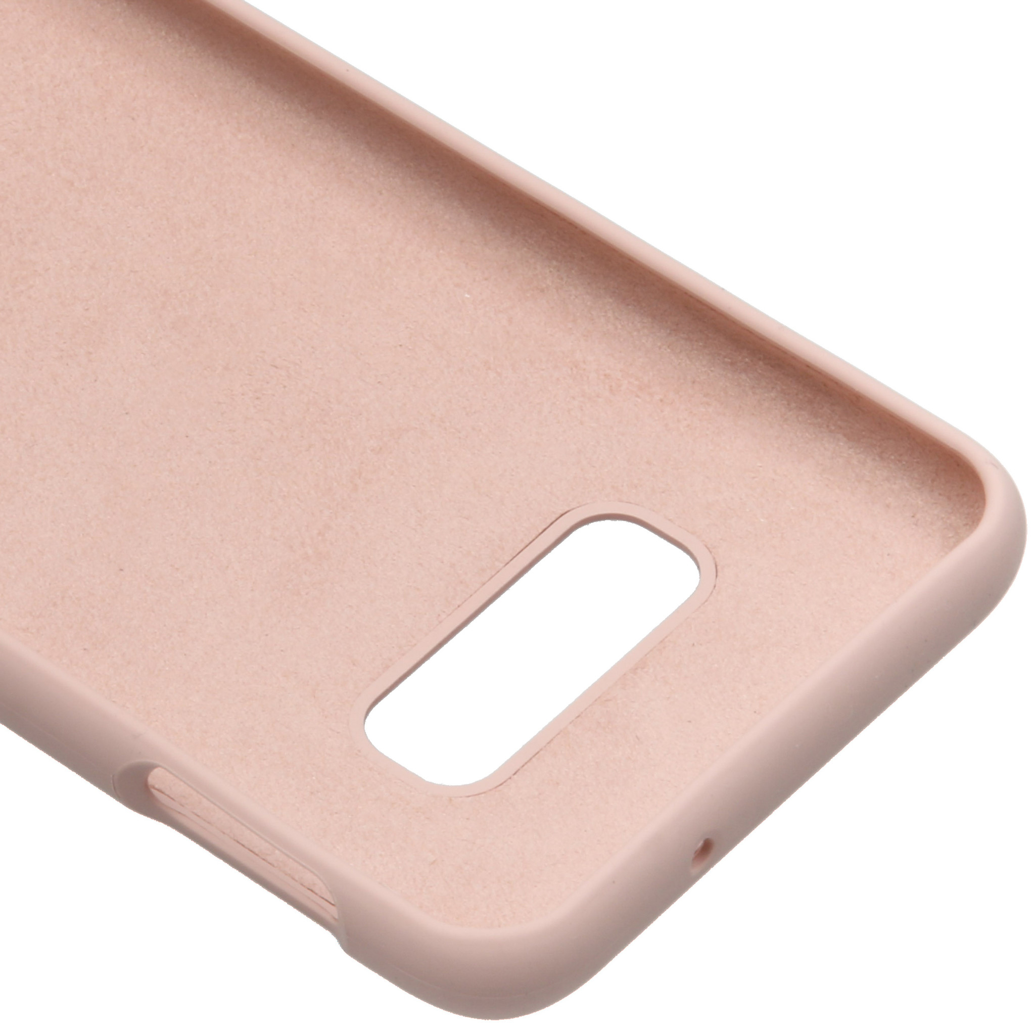 Roze telefoonhoes. Toont de binnenkant van de hoes met een rechthoekige uitsparing voor de camera.