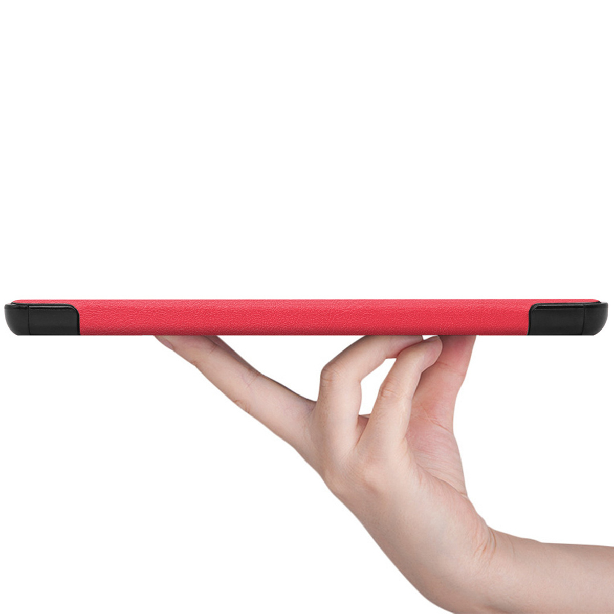 A hand holding a red phone case horizontally. The case is textured. White background.