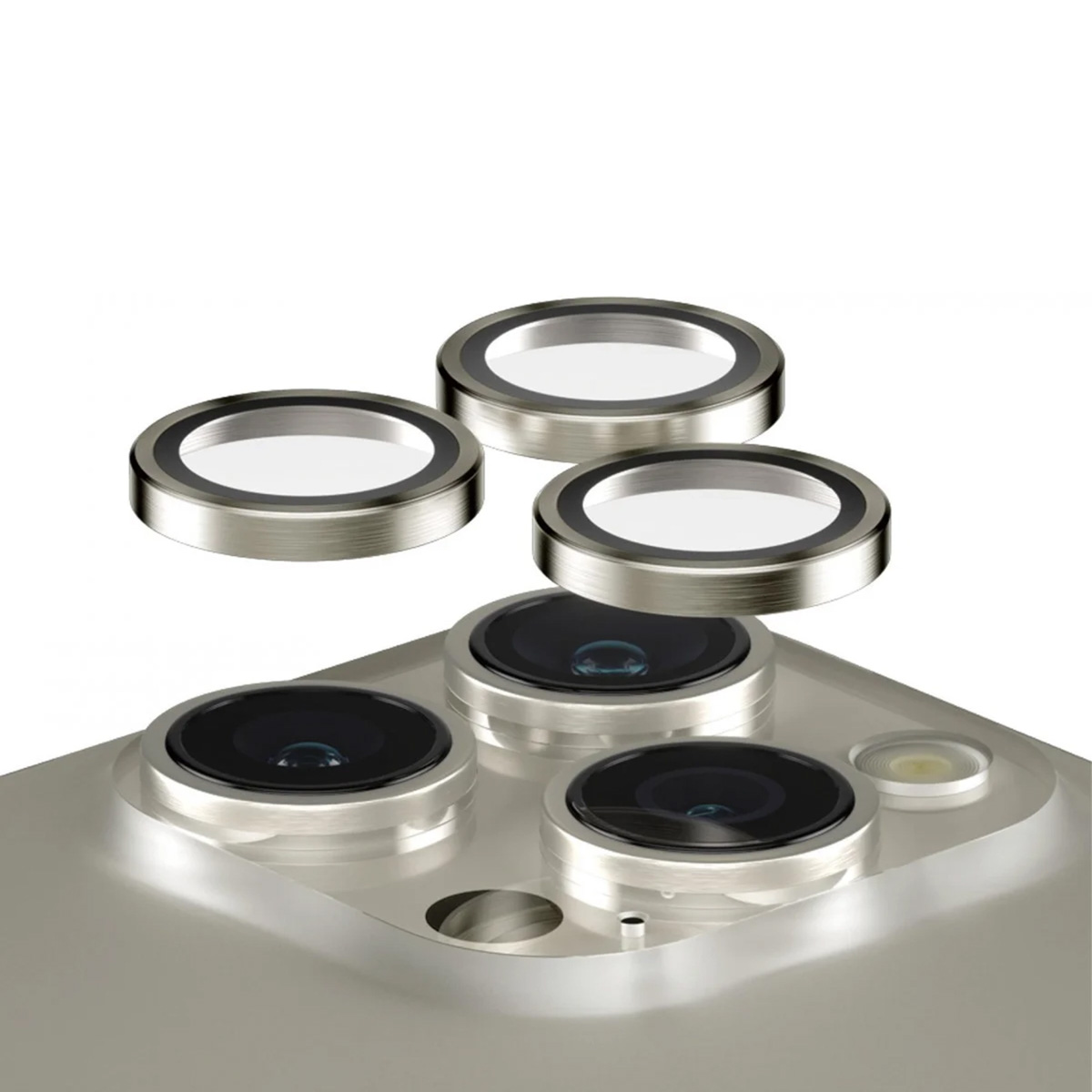 Phone lens protectors. Three lens protectors on a phone camera. Silver rings around the lenses.