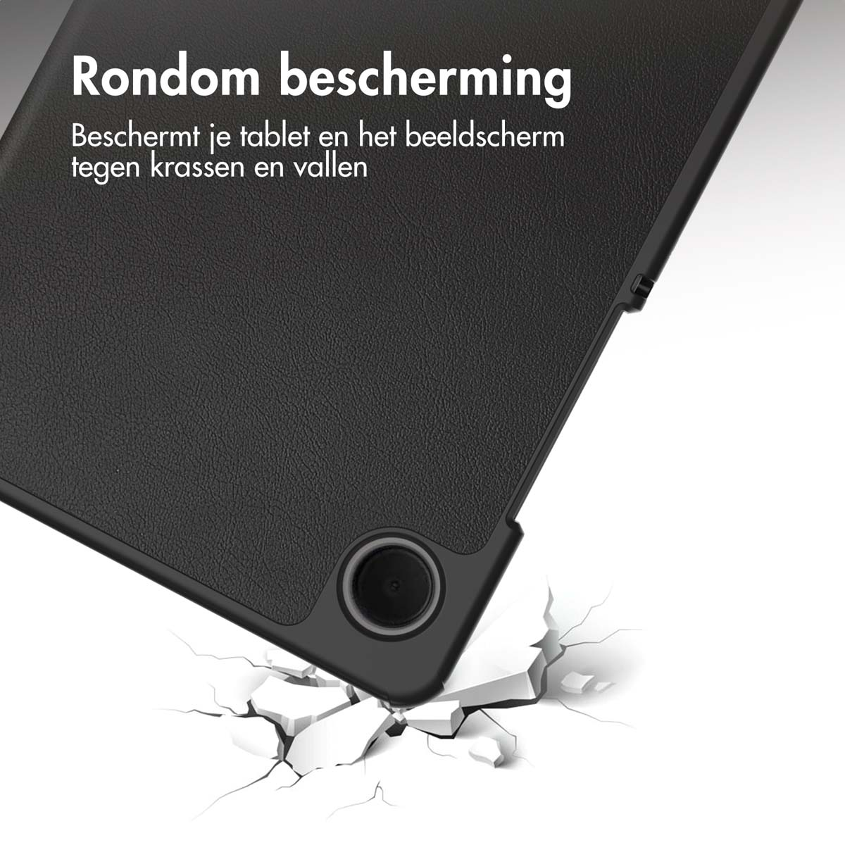 Tablette noire dans un étui noir. L'étui est sur une surface blanche, montrant une fissure dans la surface.
