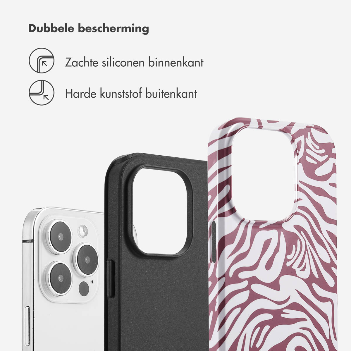 Téléphone avec un étui noir et un étui zébré blanc et rose. Fond blanc.