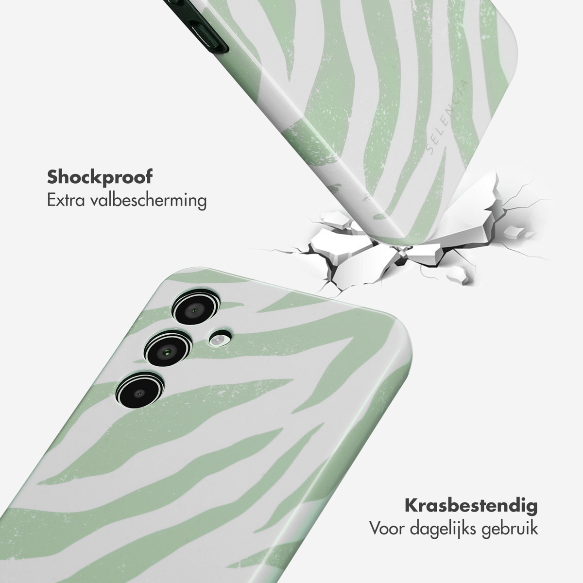 Coque de téléphone avec des rayures zébrées vertes et blanches. Le téléphone tombe, impact sur une surface blanche.