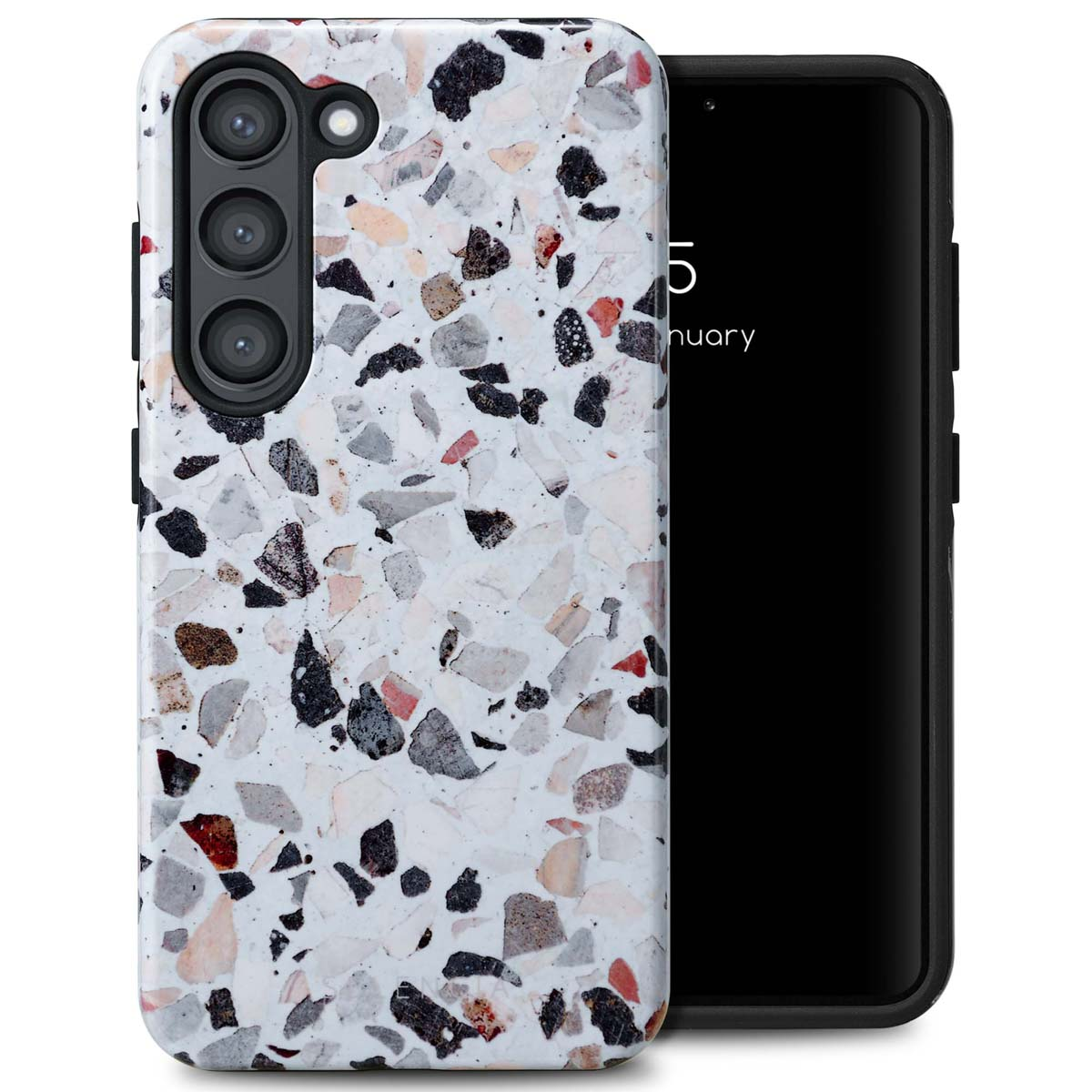 Téléphone avec une coque blanche mouchetée. Le téléphone est noir.