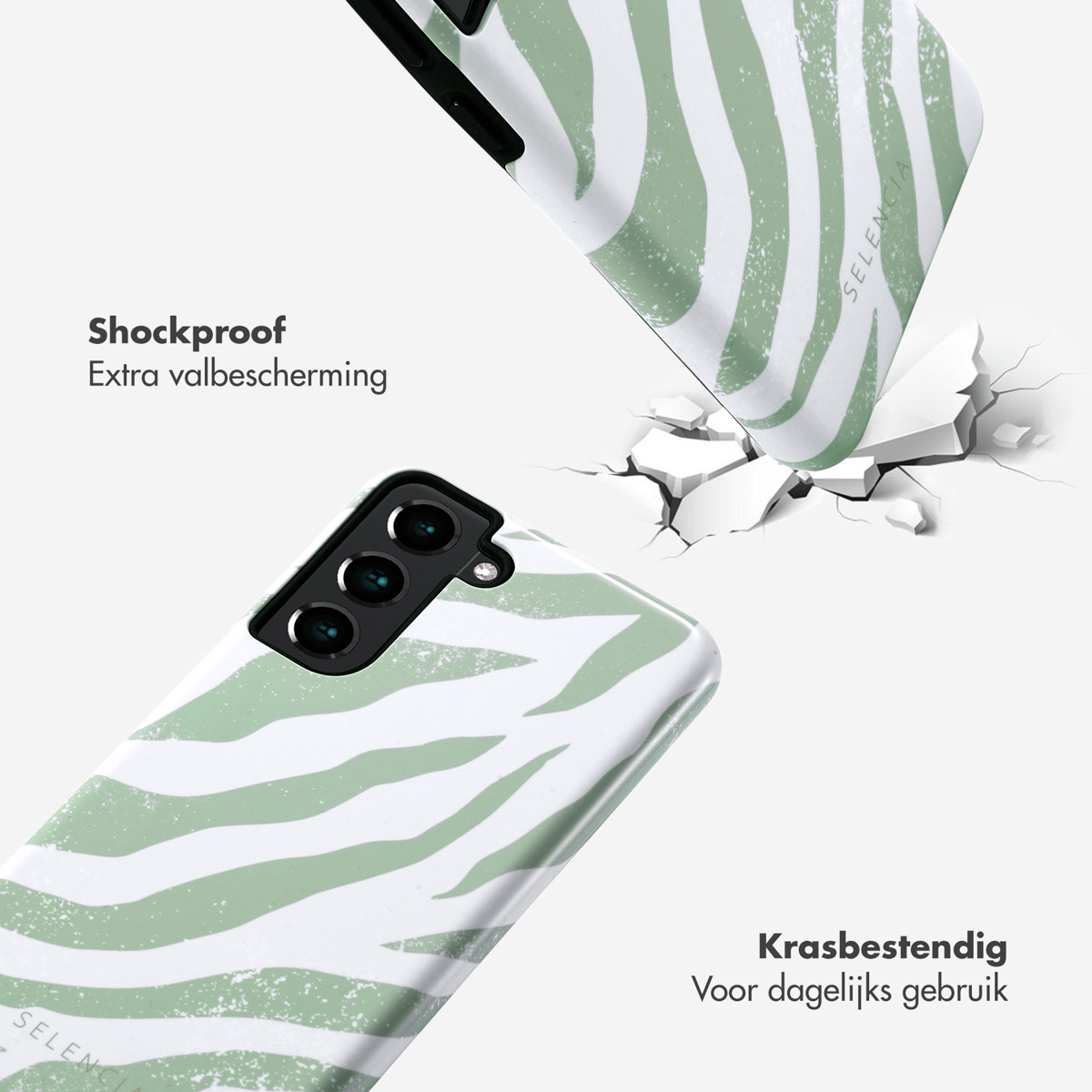 Téléphone avec coque imprimé zèbre qui se fissure. La coque est verte et blanche. La coque est en train de tomber.
