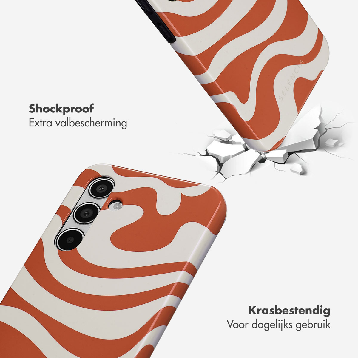 Een telefoonhoesje met een oranje werveldesign, breekt bij impact. Tekst: Schokbestendig.