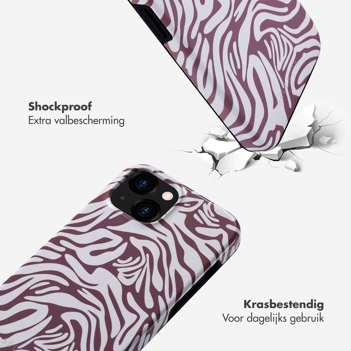 Coques de téléphone antichoc. L'une tombe et l'autre montre un motif zébré.