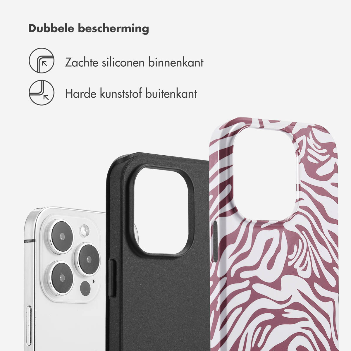 Telefoonhoesjes, witte telefoon en twee hoesjes. Eén met een zwart-wit zebrapatroon en één zwarte hoes.