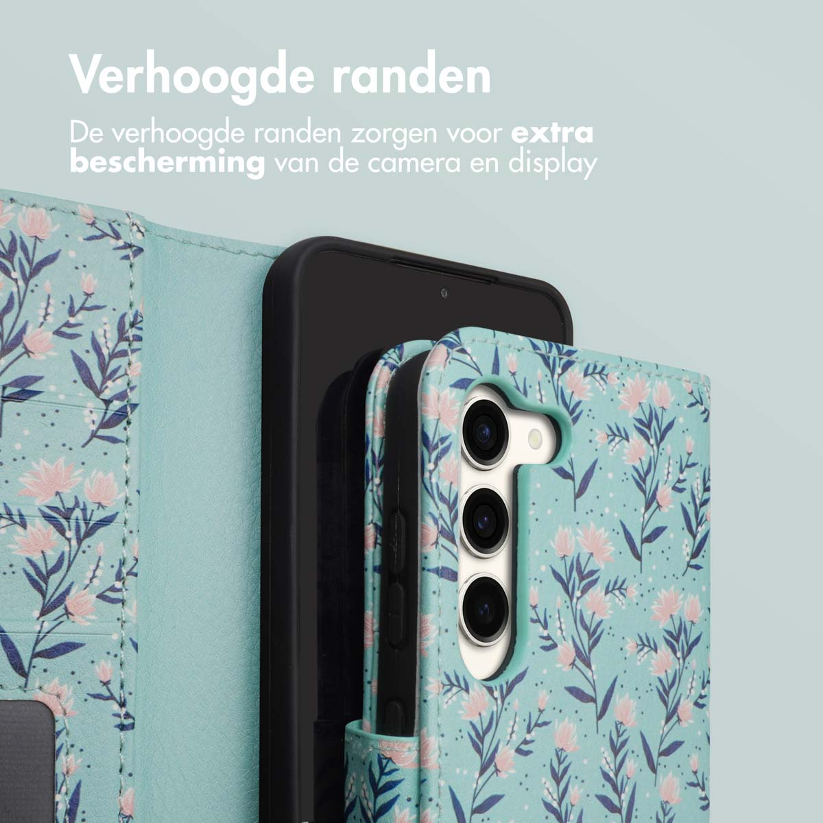 Black phone in a teal case with floral pattern. Beige background.