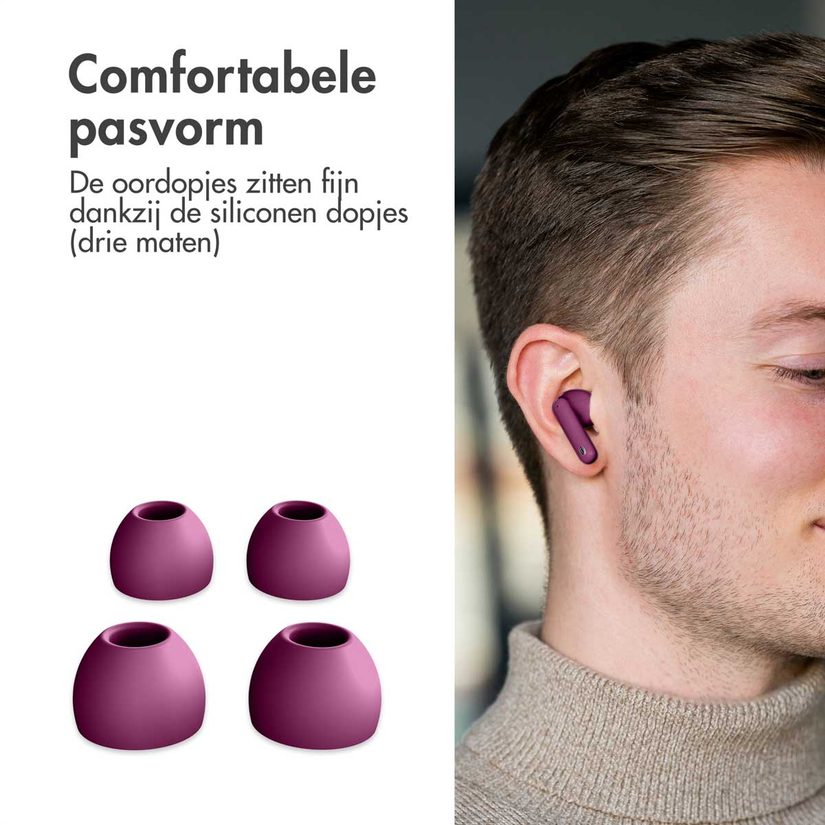 Person wearing earbuds. Four additional ear tips are displayed. Earbuds are purple.