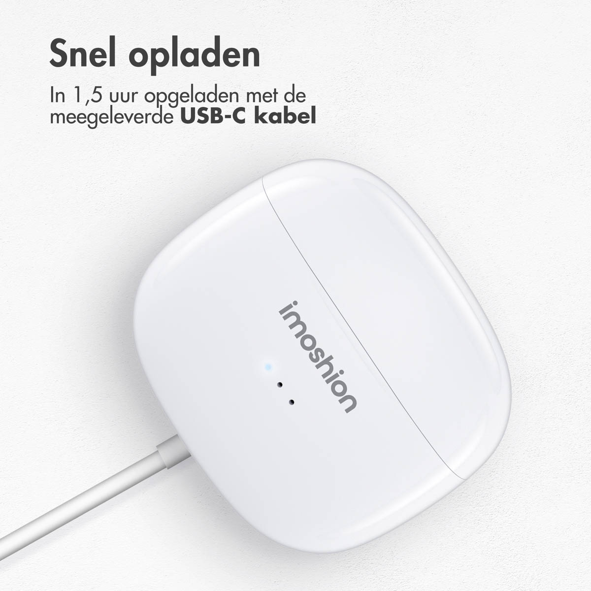 White wireless charger, with the brand name. USB-C cable plugged in. White background, bright lighting.
