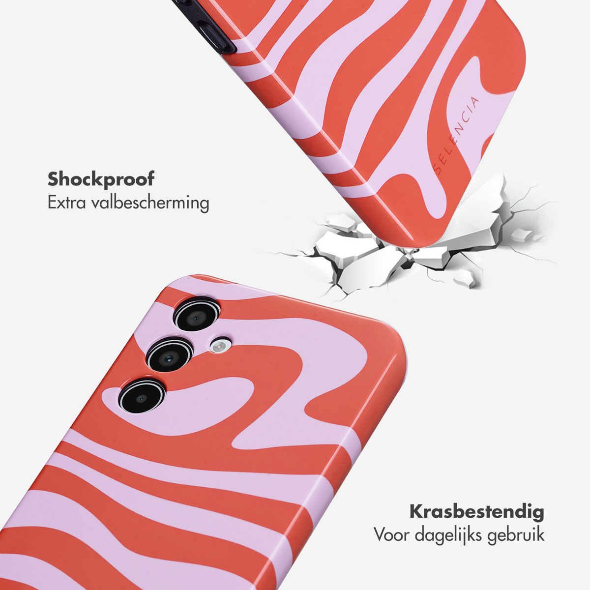 Coque de téléphone avec design abstrait rouge et rose. Le téléphone tombe au sol.