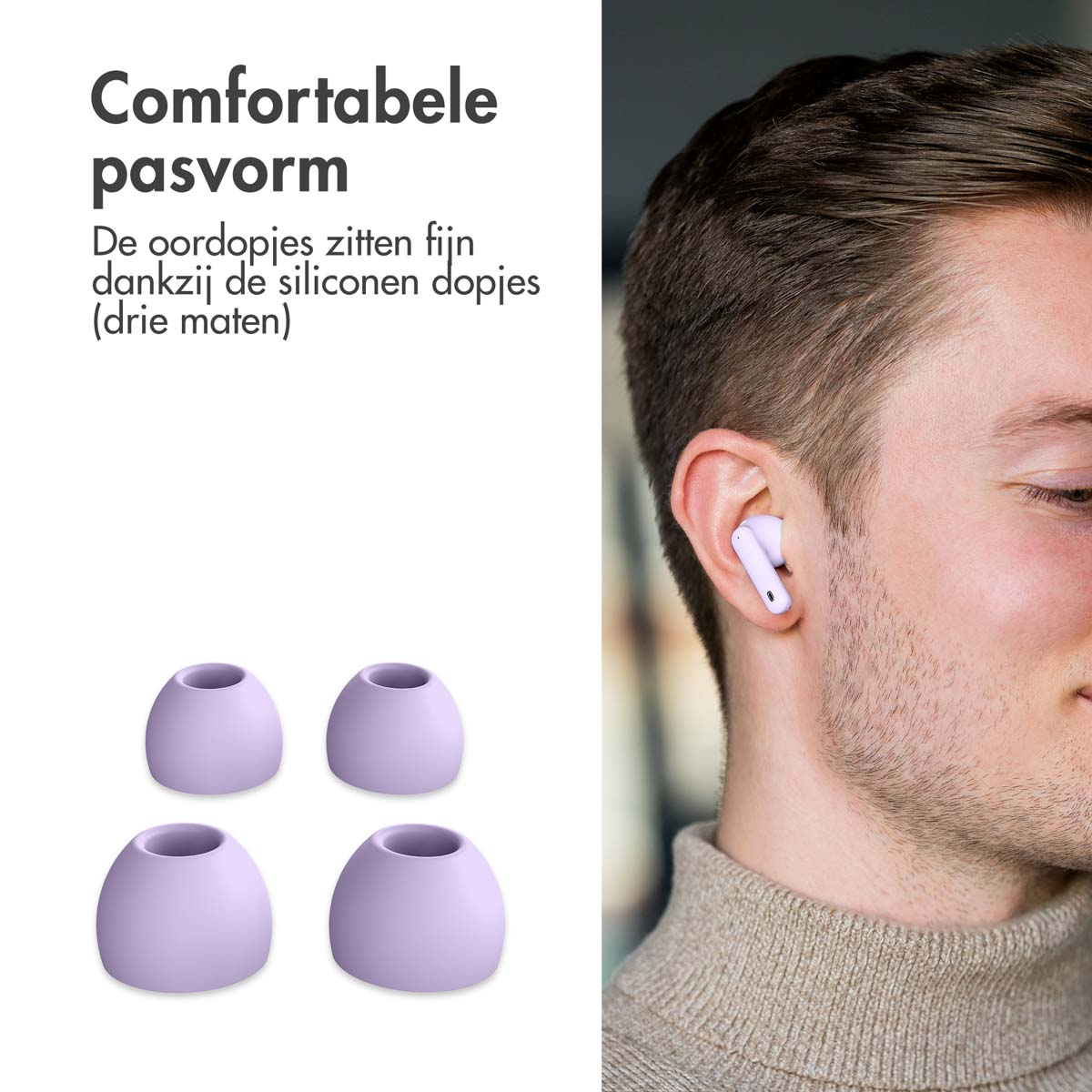 Man wearing white earbuds. Four purple silicone ear tips are in front of him.