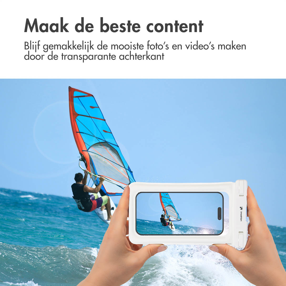 A person is taking a photo with a phone in a white waterproof case, on a beach. Sailboat in the background.