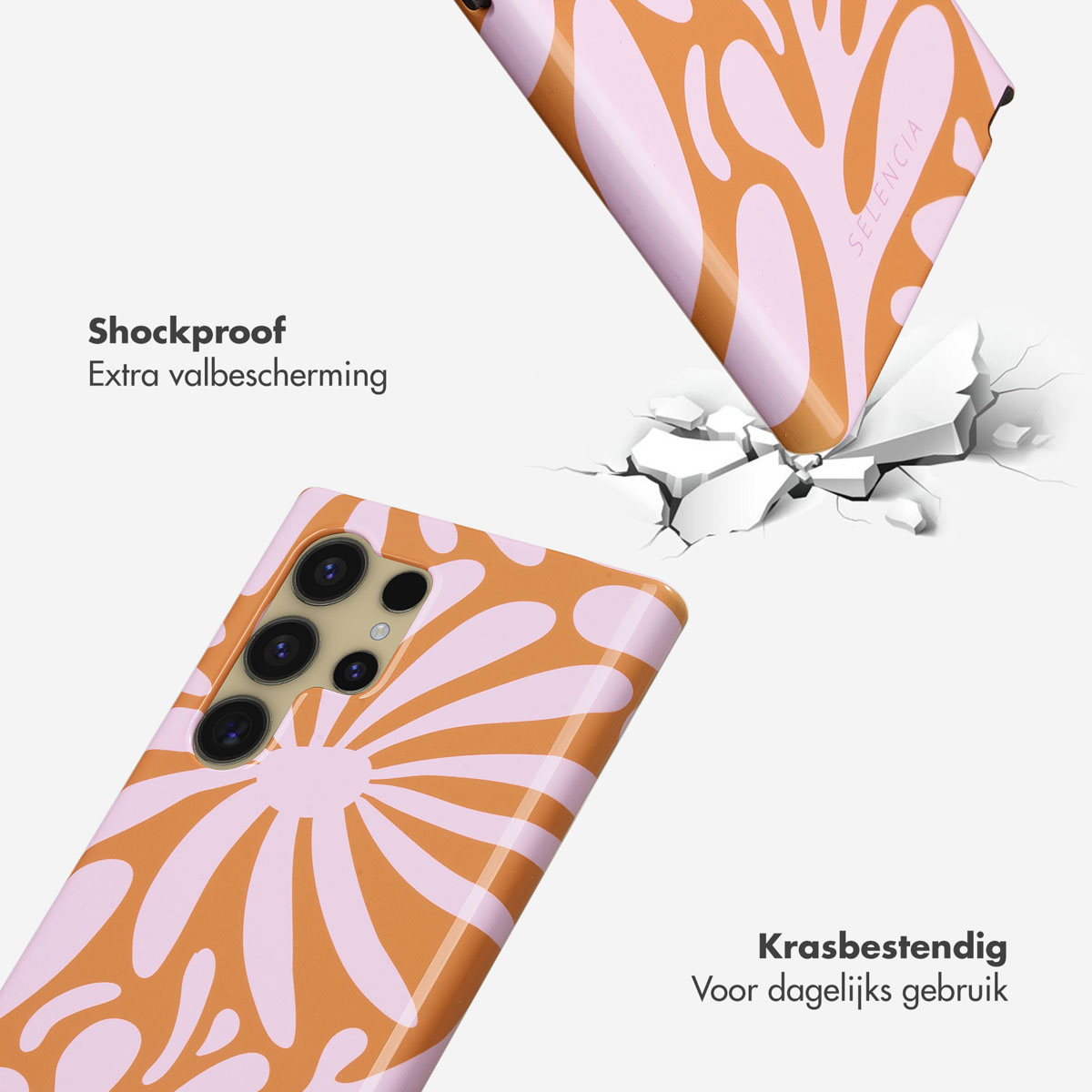Telefoonhoes valt, met oranje en roze bloemenontwerp, een barstend wit oppervlak.
