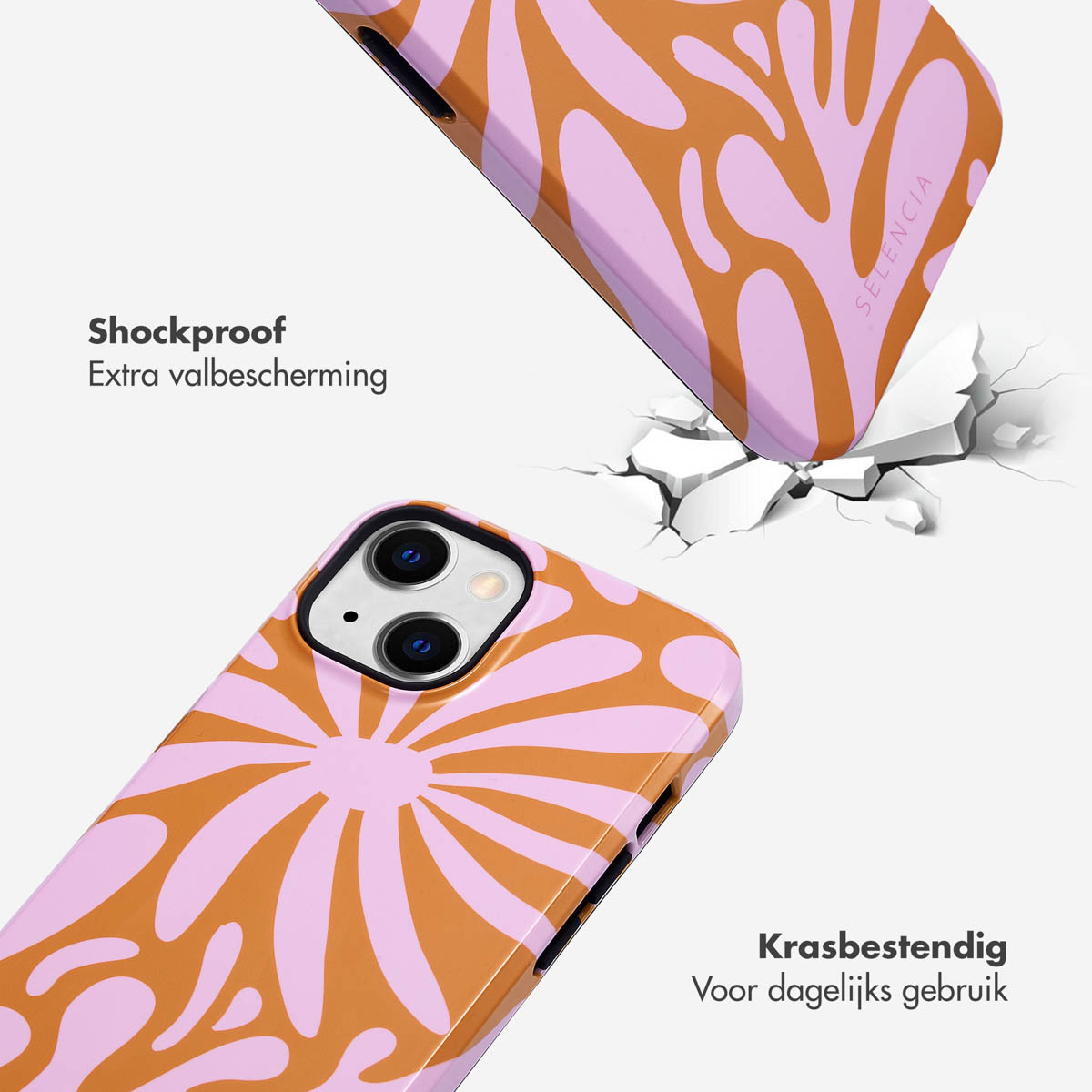 Telefoonhoesje dat valt, met een roze en oranje ontwerp. De telefoon crasht op een wit oppervlak.