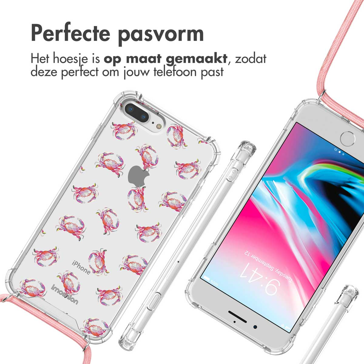 Un téléphone dans un étui transparent avec des autocollants de crabe rose. Le téléphone a une lanière rose attachée.