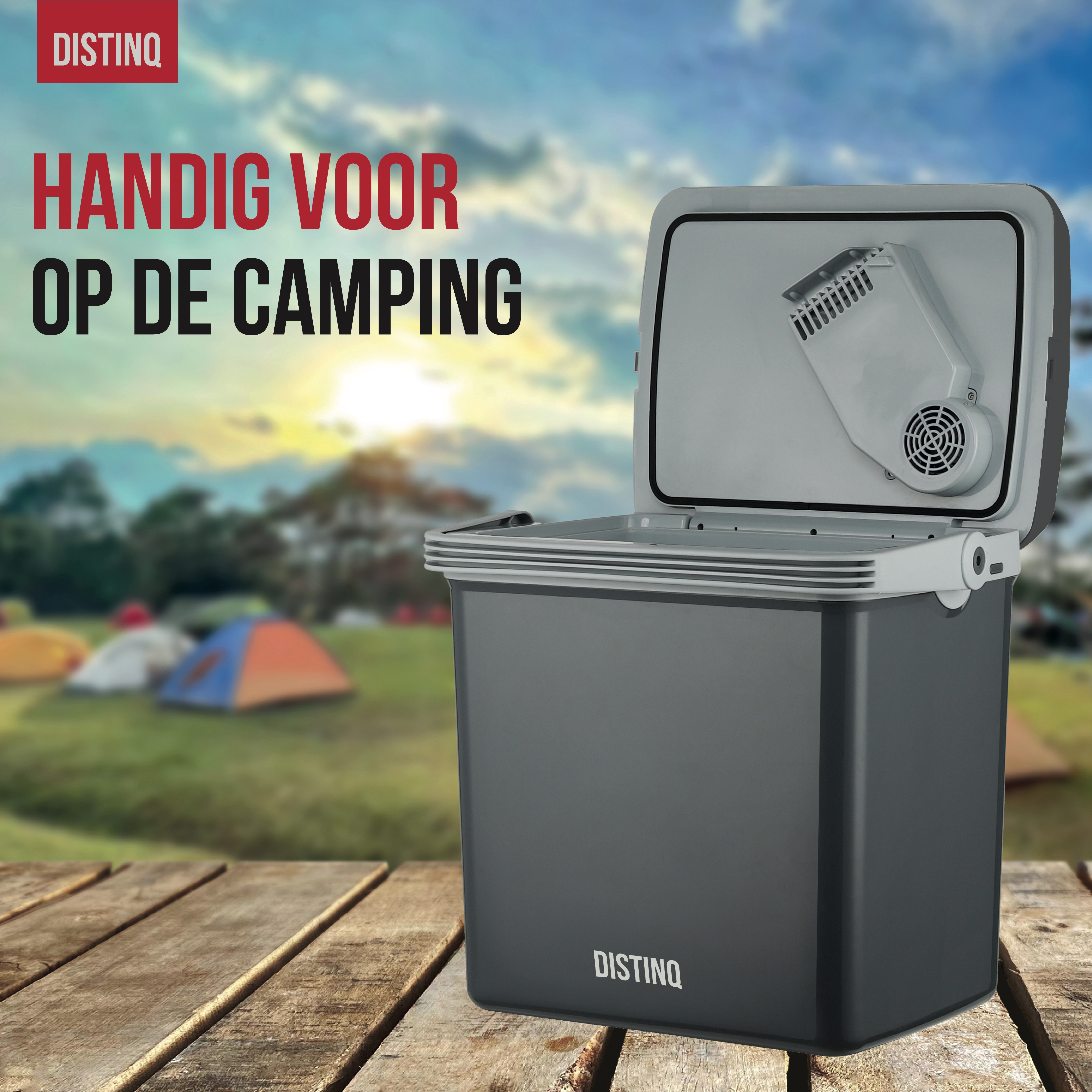 A gray cooler, open, on wooden planks. Text: Handy for camping. Trees and tents in the background.