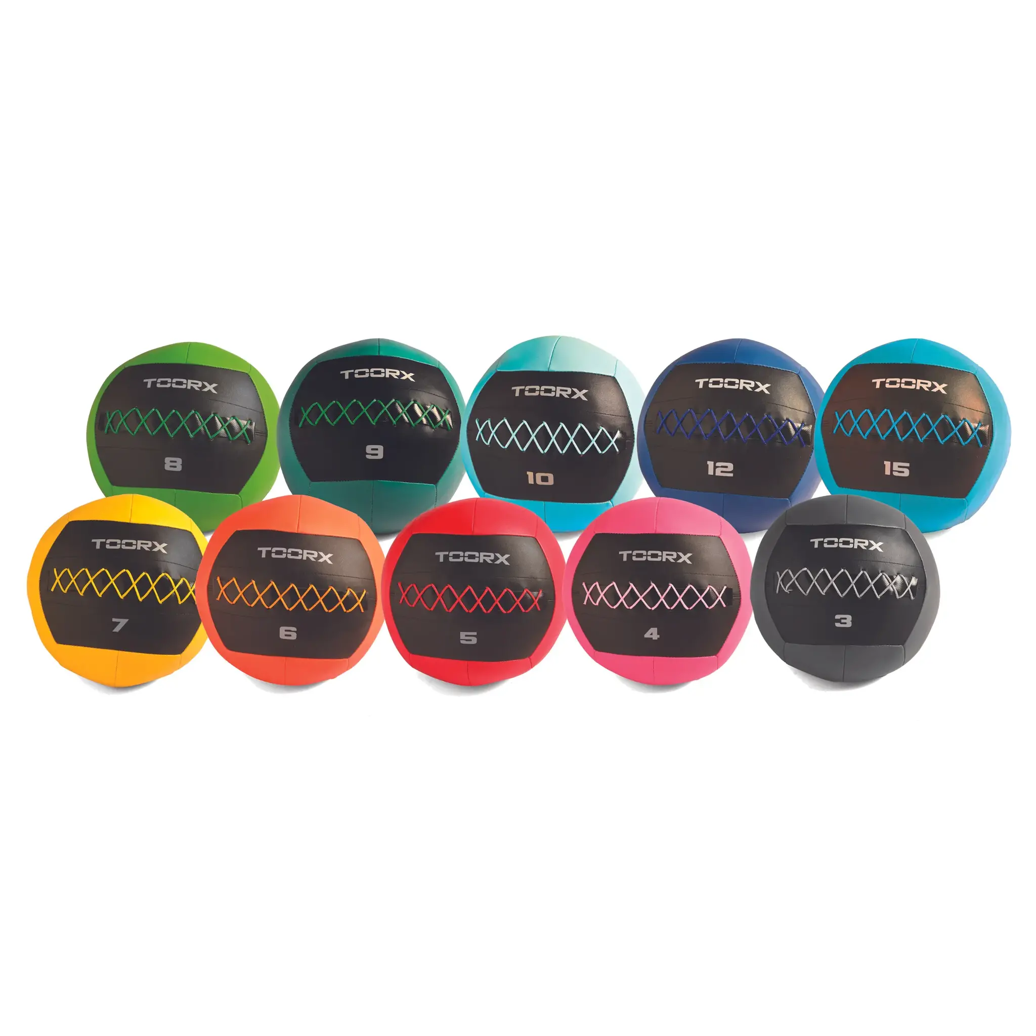 Tien medicijnballen in verschillende kleuren: groen, oranje, blauwgroen, blauw, zwart, geel, rood, roze en grijs.