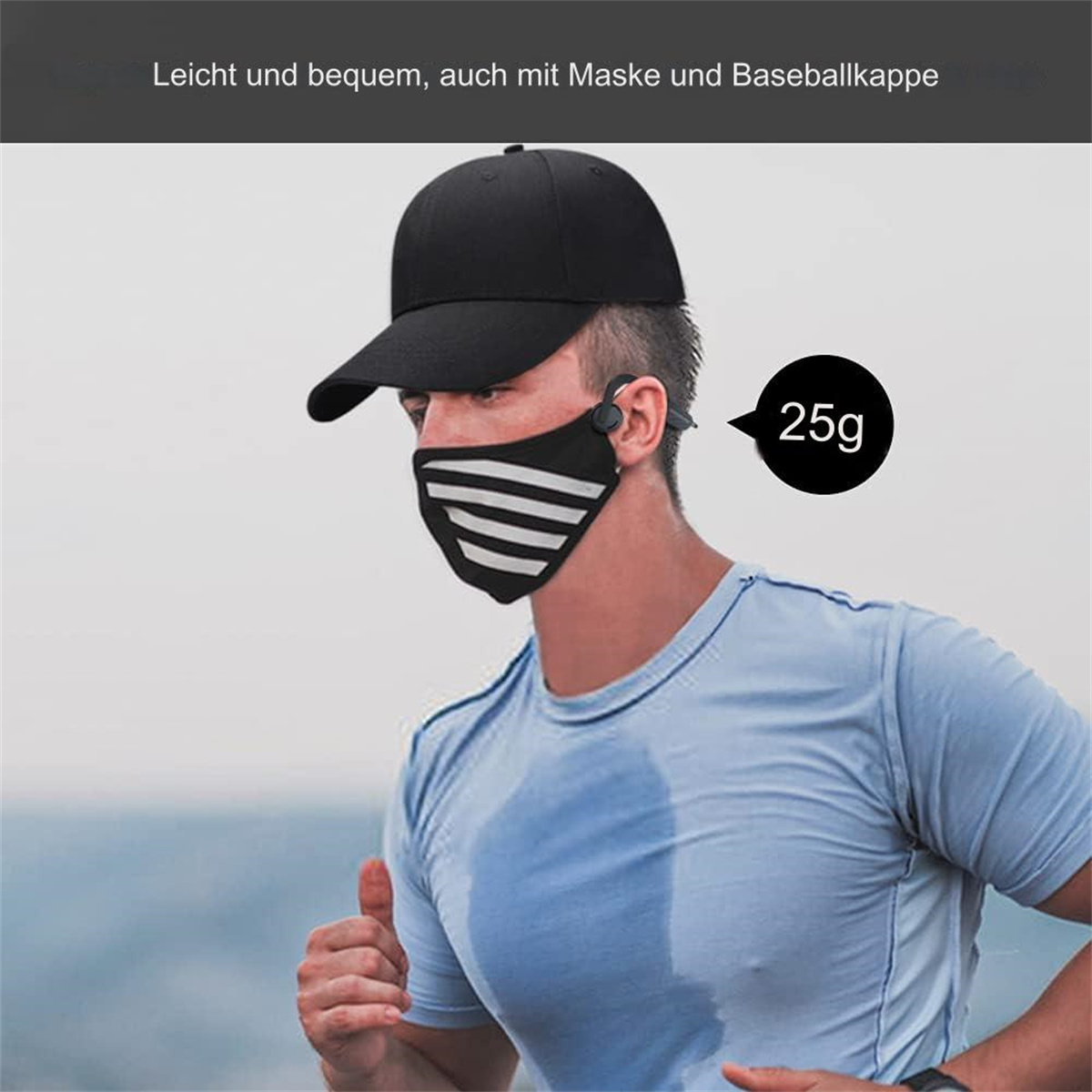 Mann rennt mit schwarzer Kappe und Maske, ein 25g-Anhänger ist an seinem Ohr befestigt.