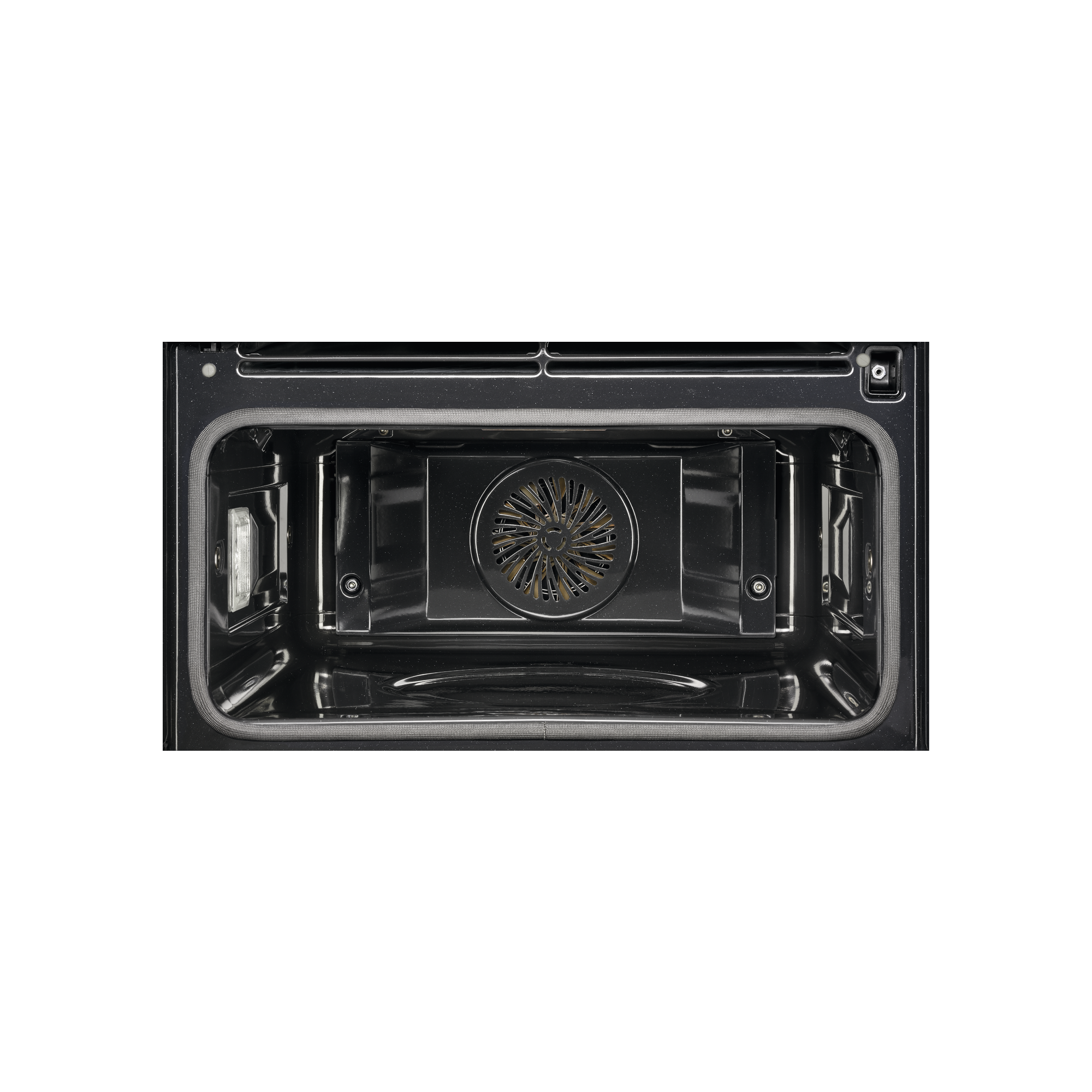 Interior del horno. Negro, con ventilador, luz y junta gris alrededor de la puerta.
