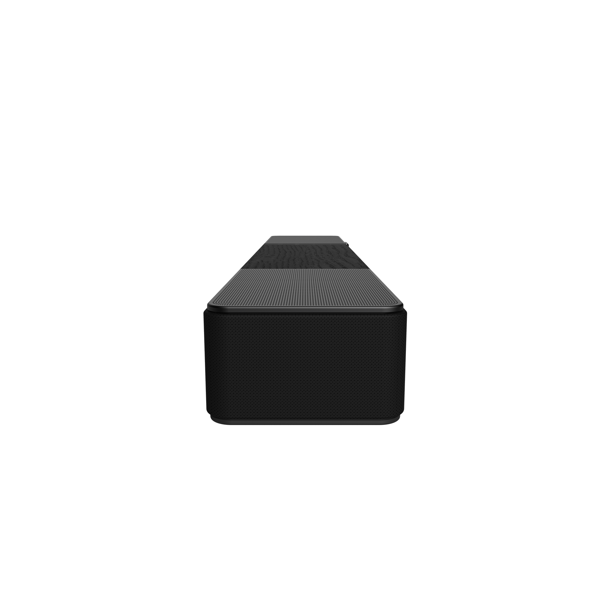 Czarny soundbar na czarnym tle. Soundbar jest prostokątny z siatkowym przodem i górą.