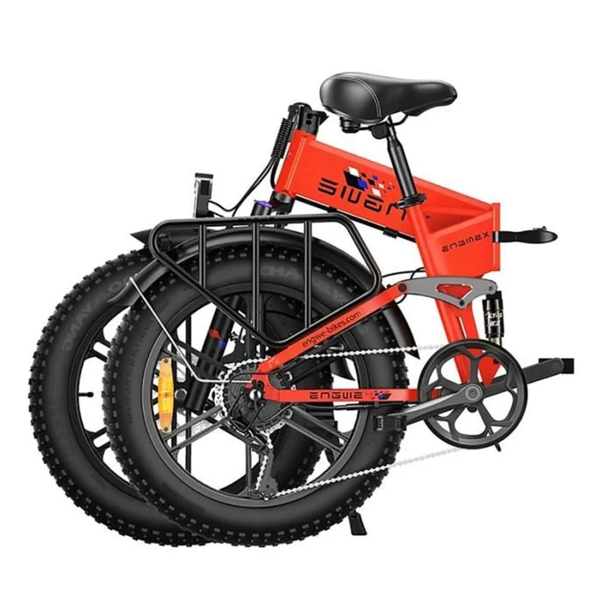 E-bike pieghevole rossa con pneumatici larghi e portapacchi.
