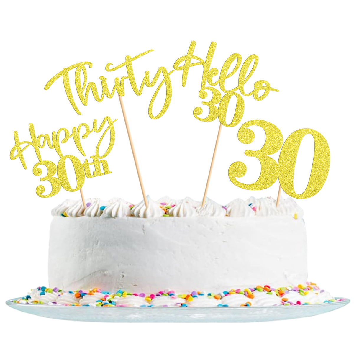 Weißer Kuchen mit goldenen Glitzer-Toppern: „Thirty“, „Hello 30“, „Happy 30th“ und „30“.