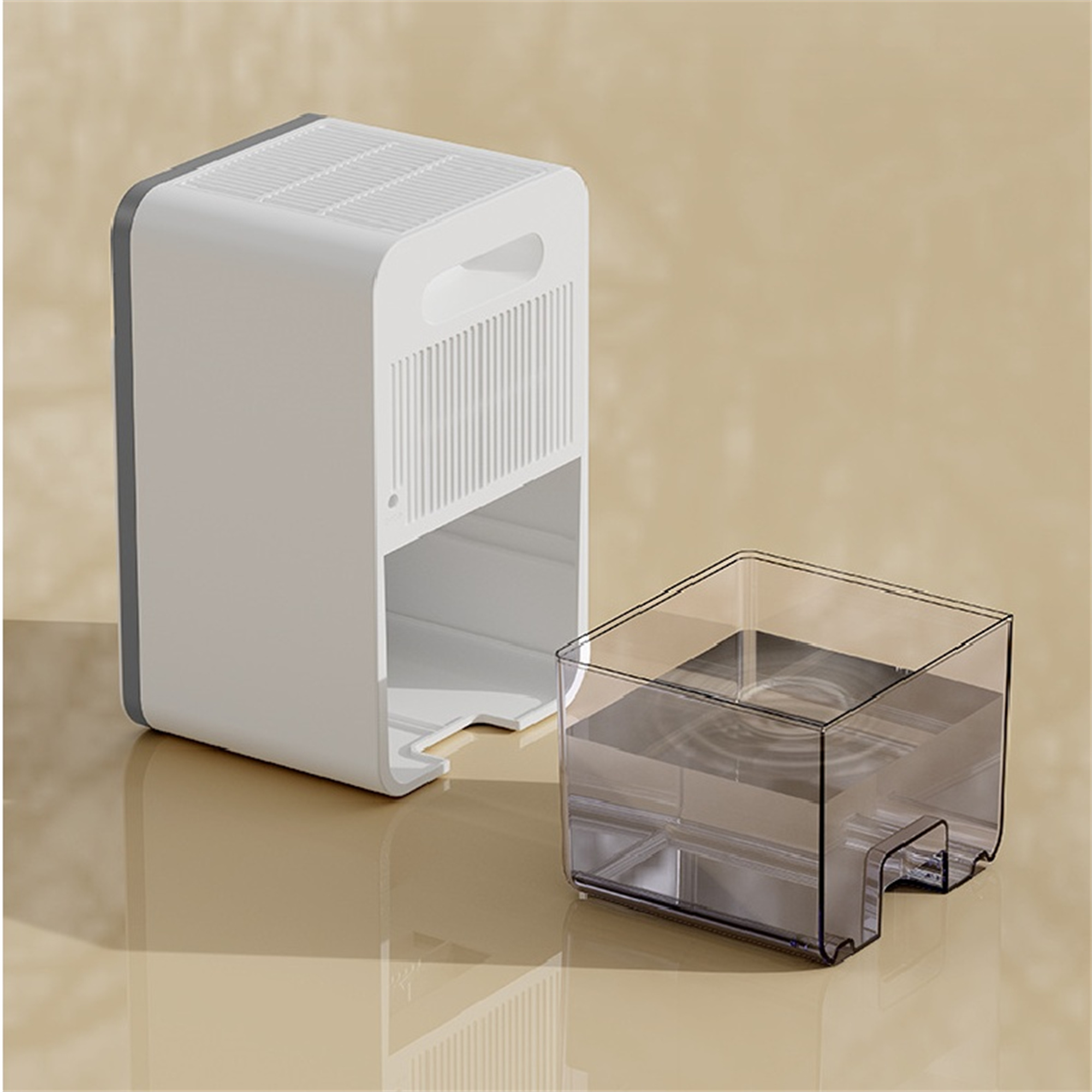 Weißer und grauer Luftentfeuchter mit transparentem Wassertank.