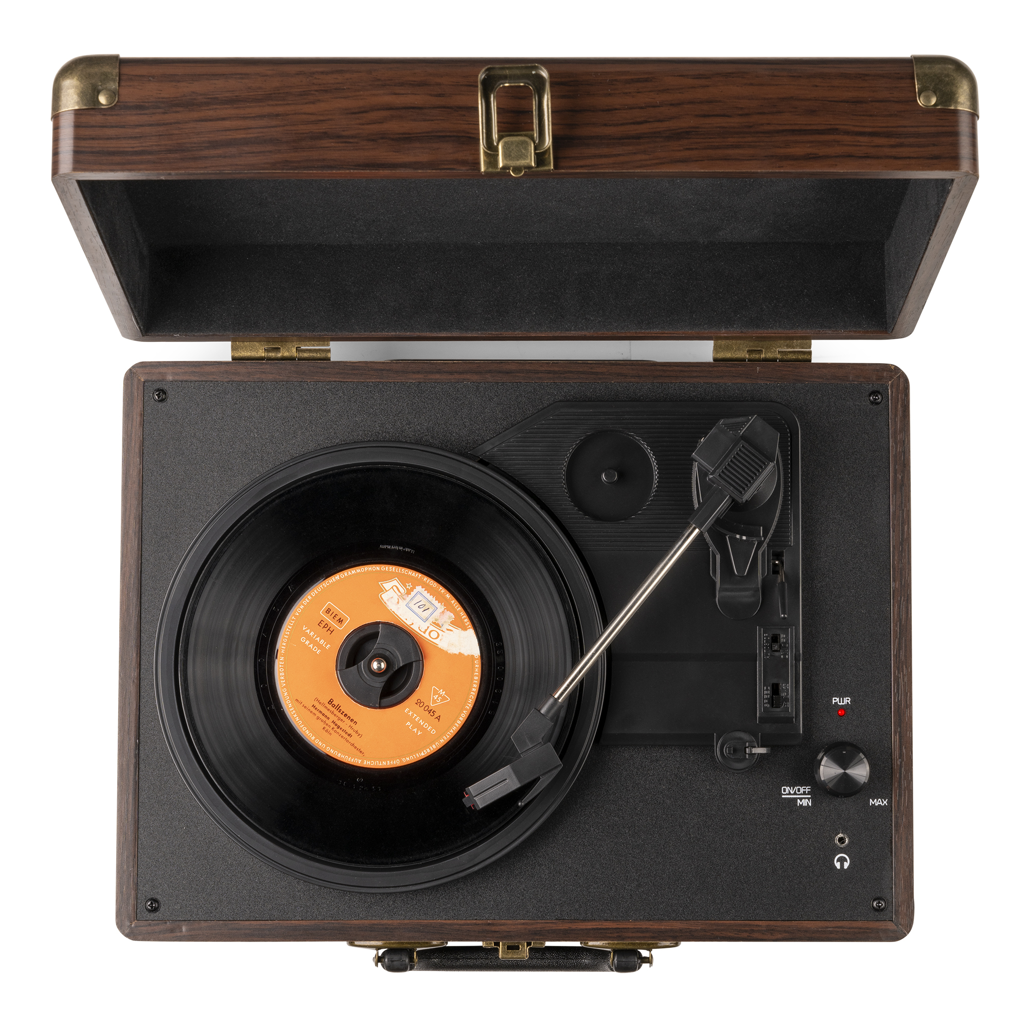 Tocadiscos de madera con disco negro en reproducción; tapa abierta muestra el interior.