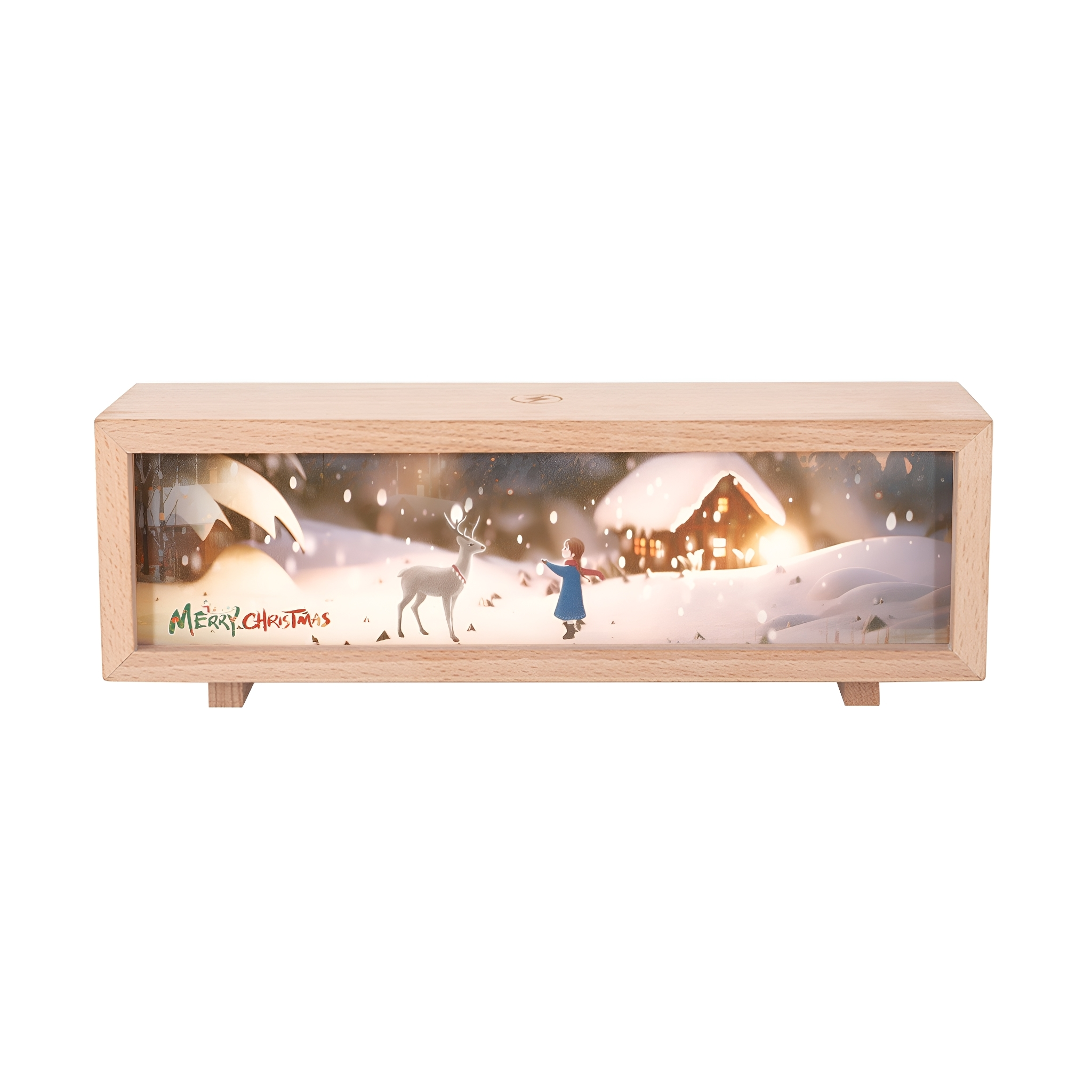 Weihnachtsszene aus Holz mit Haus, Hirsch und Kind. Schnee fällt.
