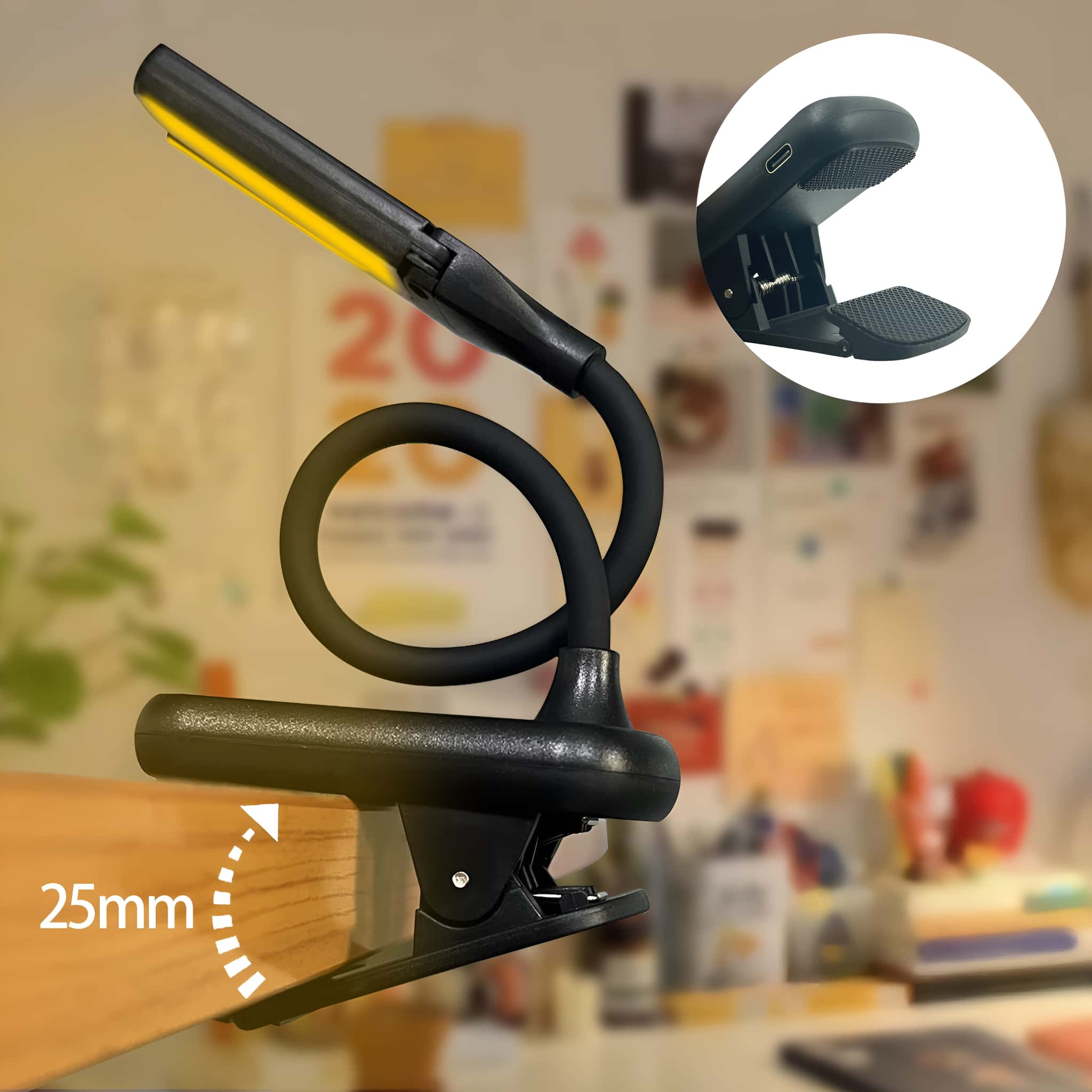 Schwarze und gelbe flexible Schreibtischlampe mit Clipfuß. Eine Holzoberfläche ist sichtbar.