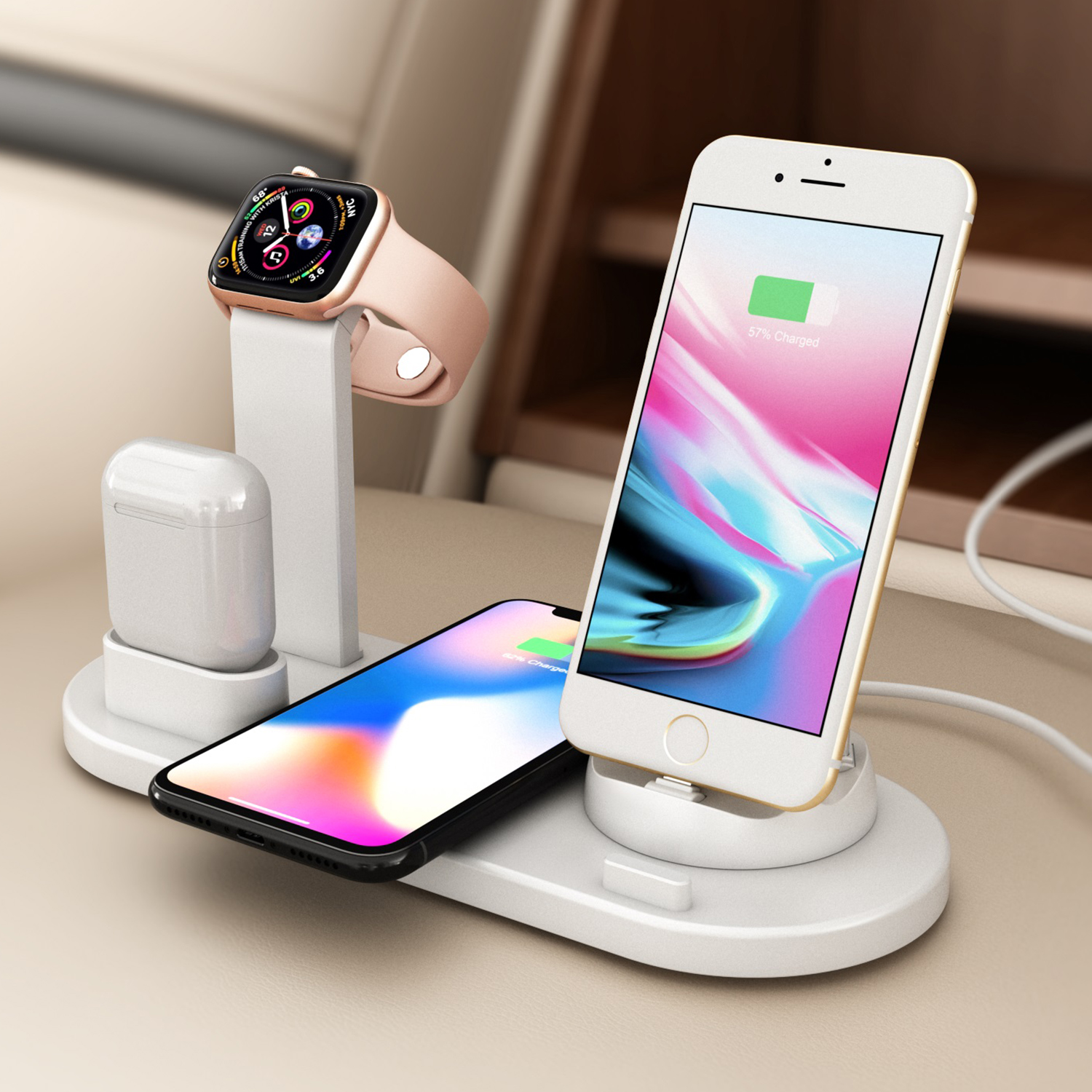 Estación de carga con reloj, auriculares y dos teléfonos. Diseño de carga inalámbrica.