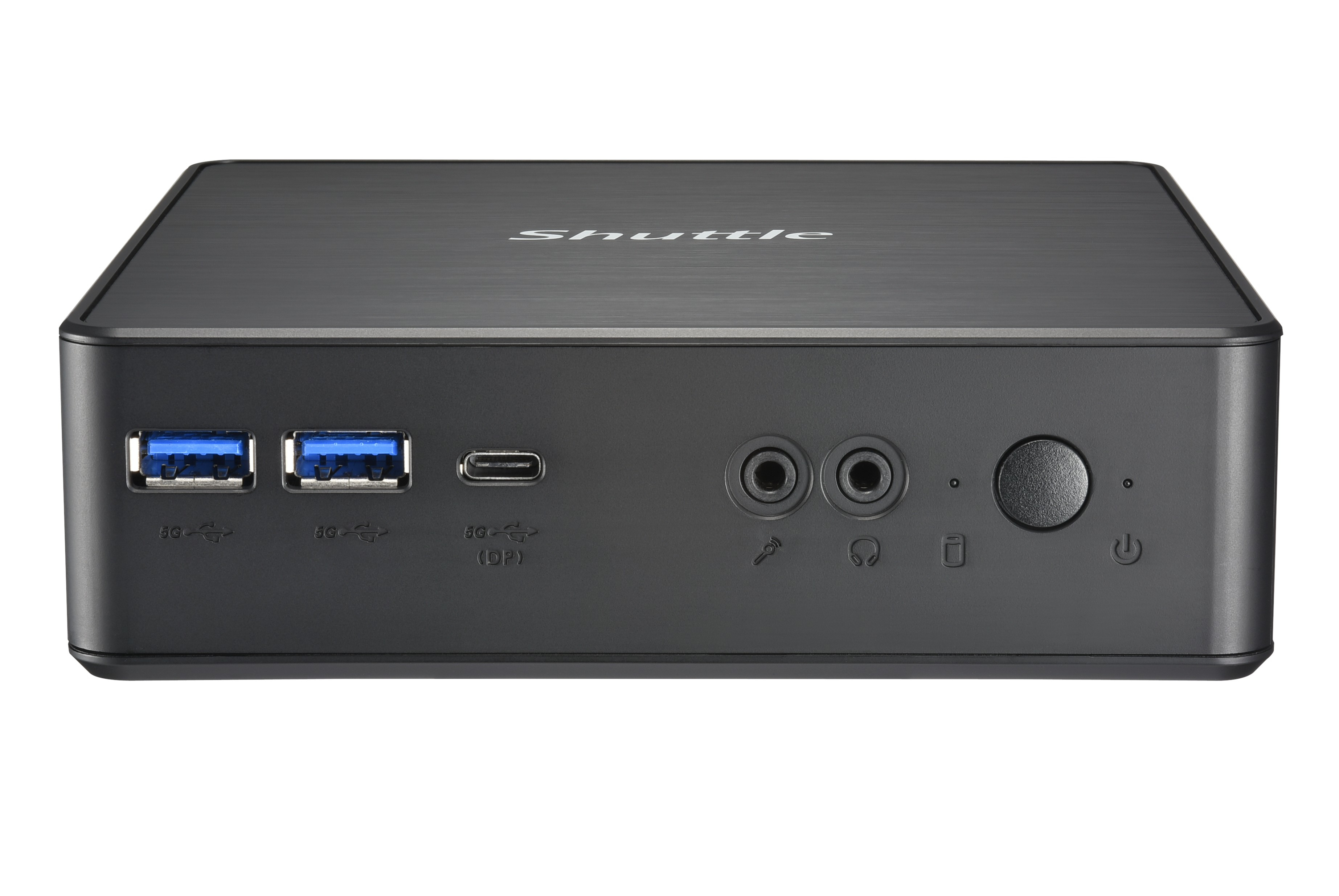 Un mini-PC Shuttle nero che mostra il pannello frontale con le porte e il marchio.