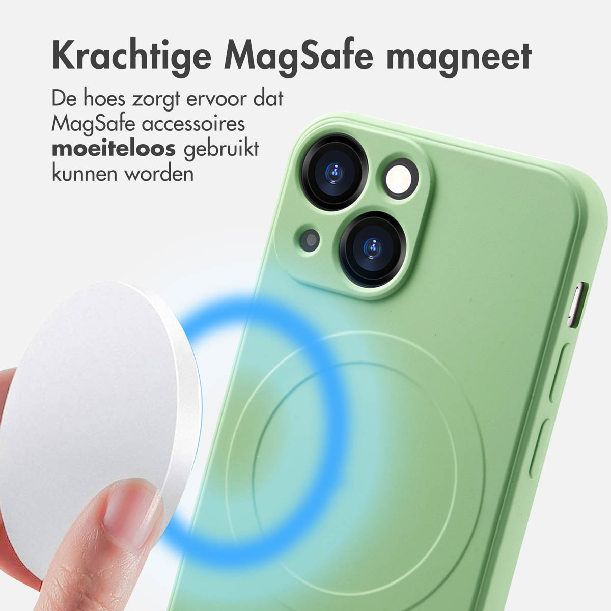 Coque de téléphone verte avec chargeur MagSafe blanc attaché, montrant un champ magnétique bleu. Une main tient le chargeur.