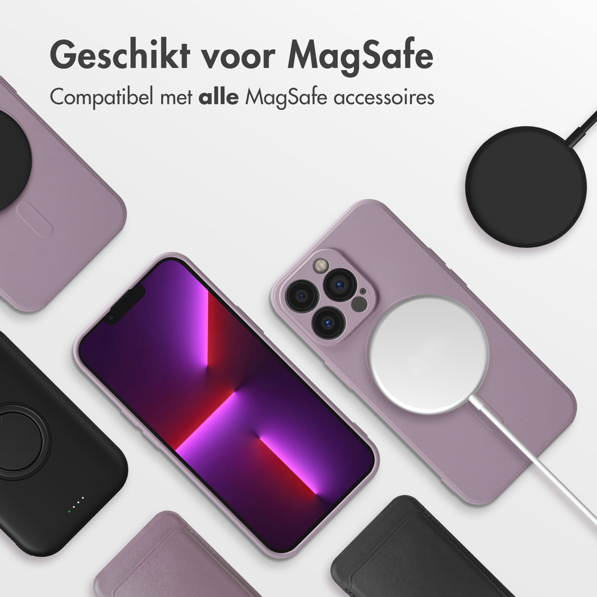 Meerdere telefoons met hoesjes, met een draadloze oplader. Kleuren zijn paars, zwart en wit.
