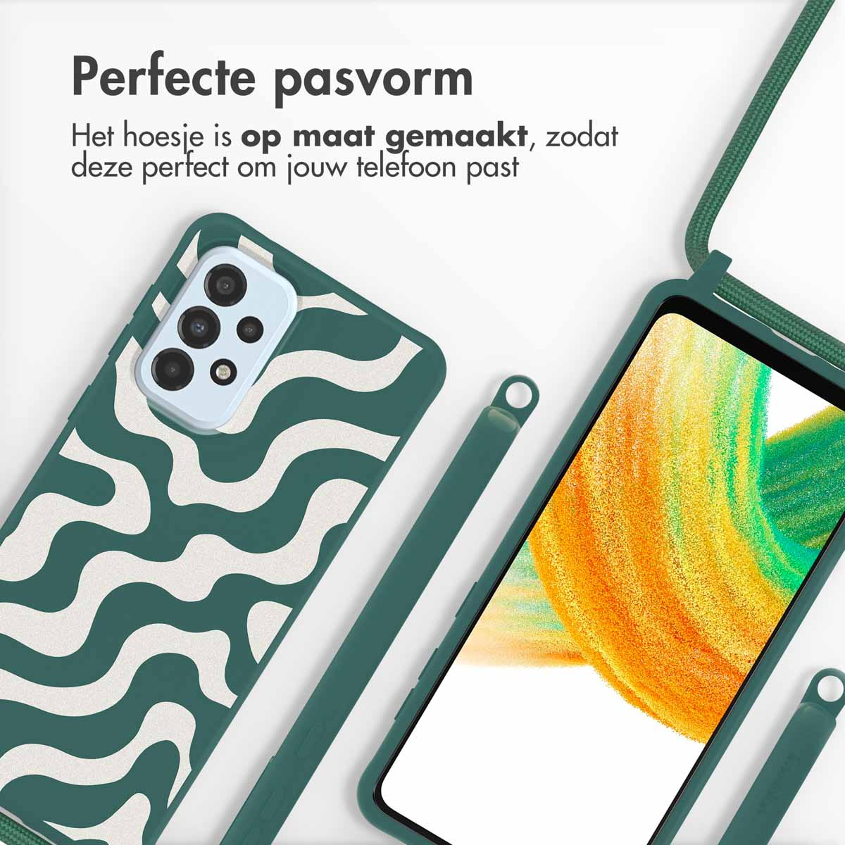 Groene telefoonhoes met een wit golfpatroon, telefoon erin.
