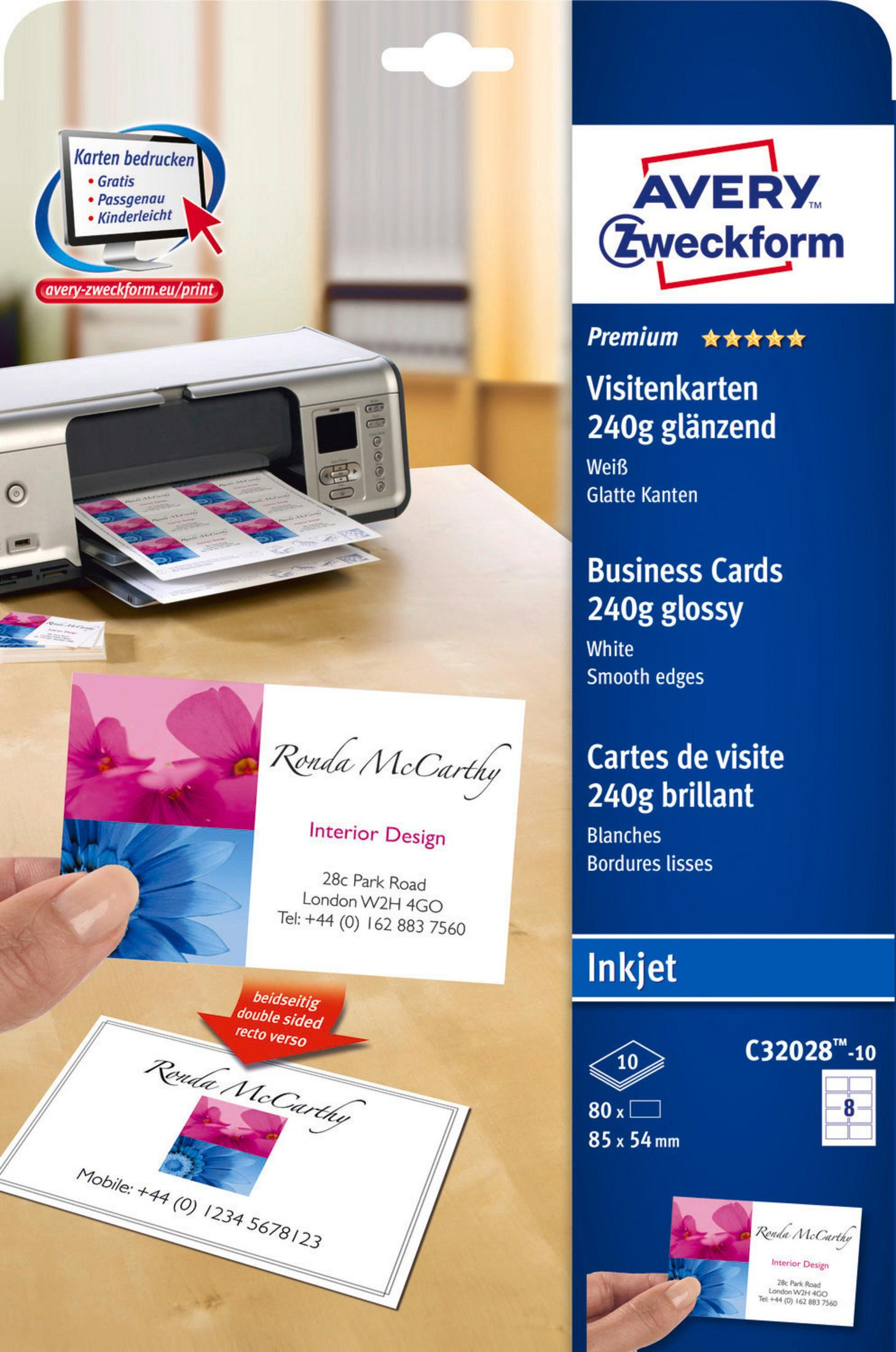 Ein Drucker druckt Visitenkarten. Eine Hand hält eine Karte mit rosa und blauem Blumendesign. Das Avery-Logo ist sichtbar.