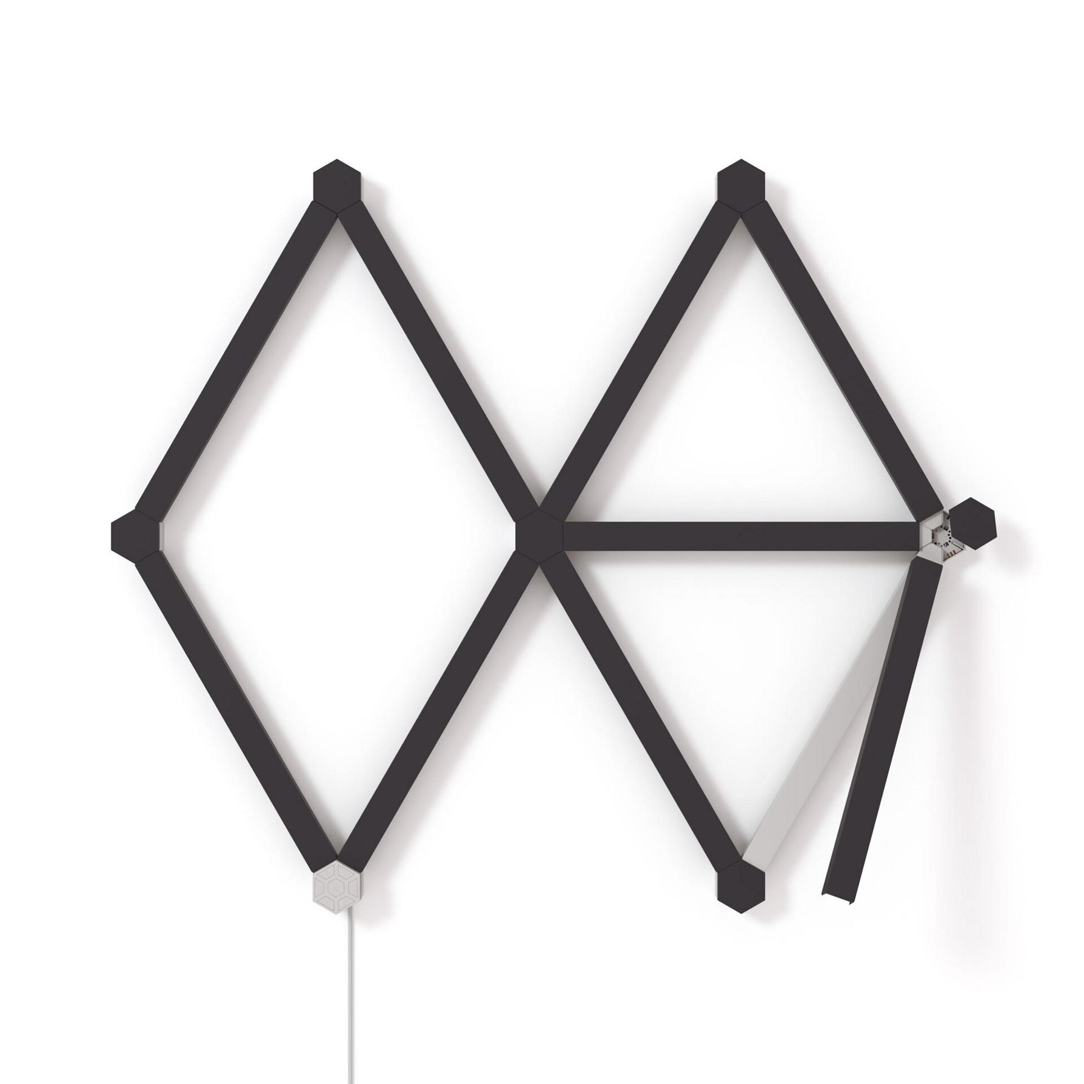 Geometric black wall light fixture on white background, with a hexagonal shape and a cable.